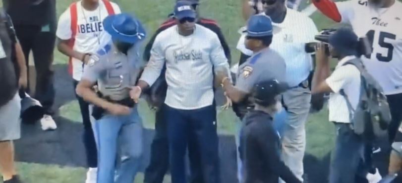 Deion Sanders shoved by Alabama State's Eddie Robinson Jr. in heated  on-field exchange after game 