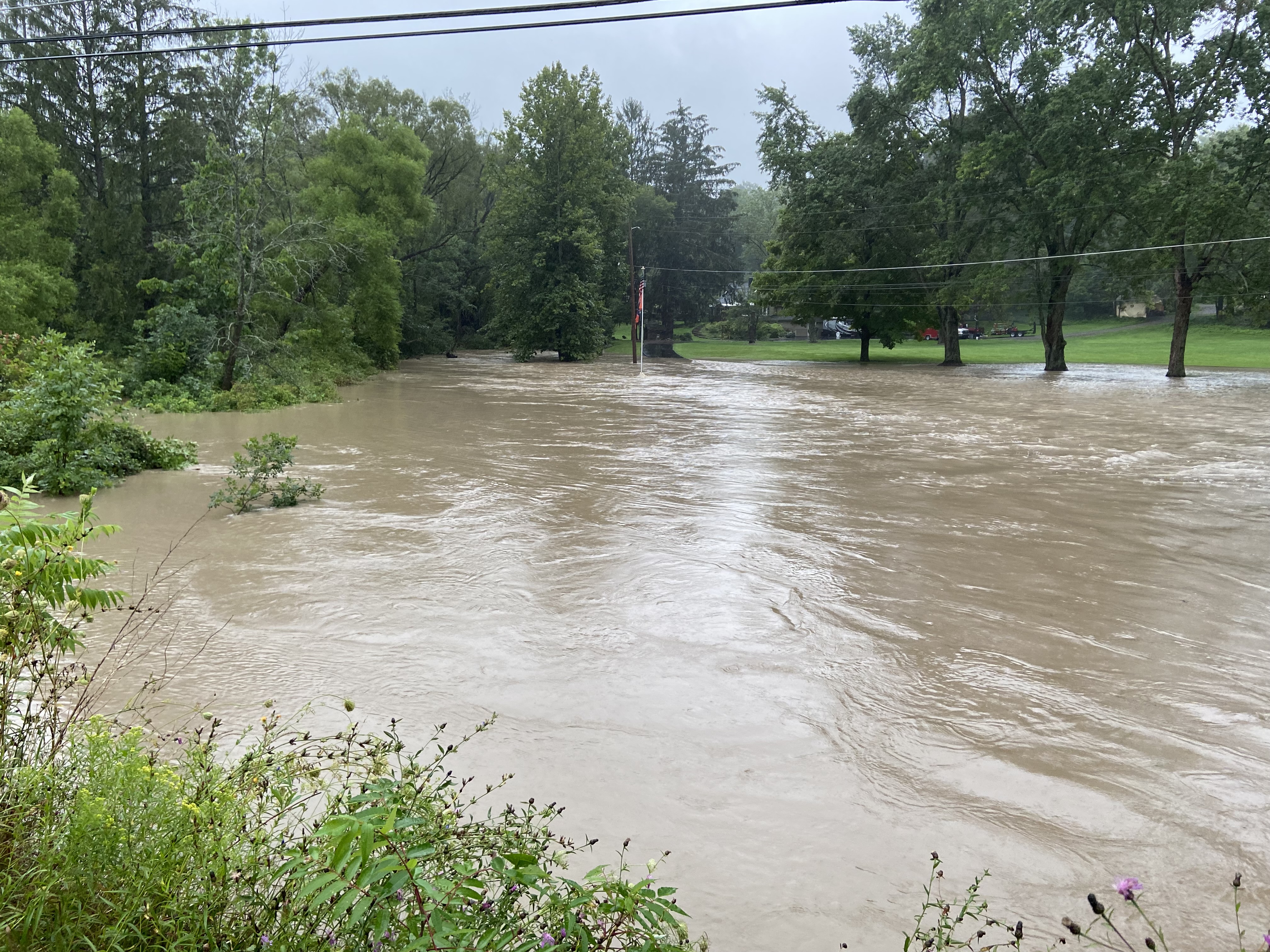 Flooding along the west side of South Street Road (Route 174) near Nightingale Mills, Marcellus on Thursday, Aug. 19, 2021.