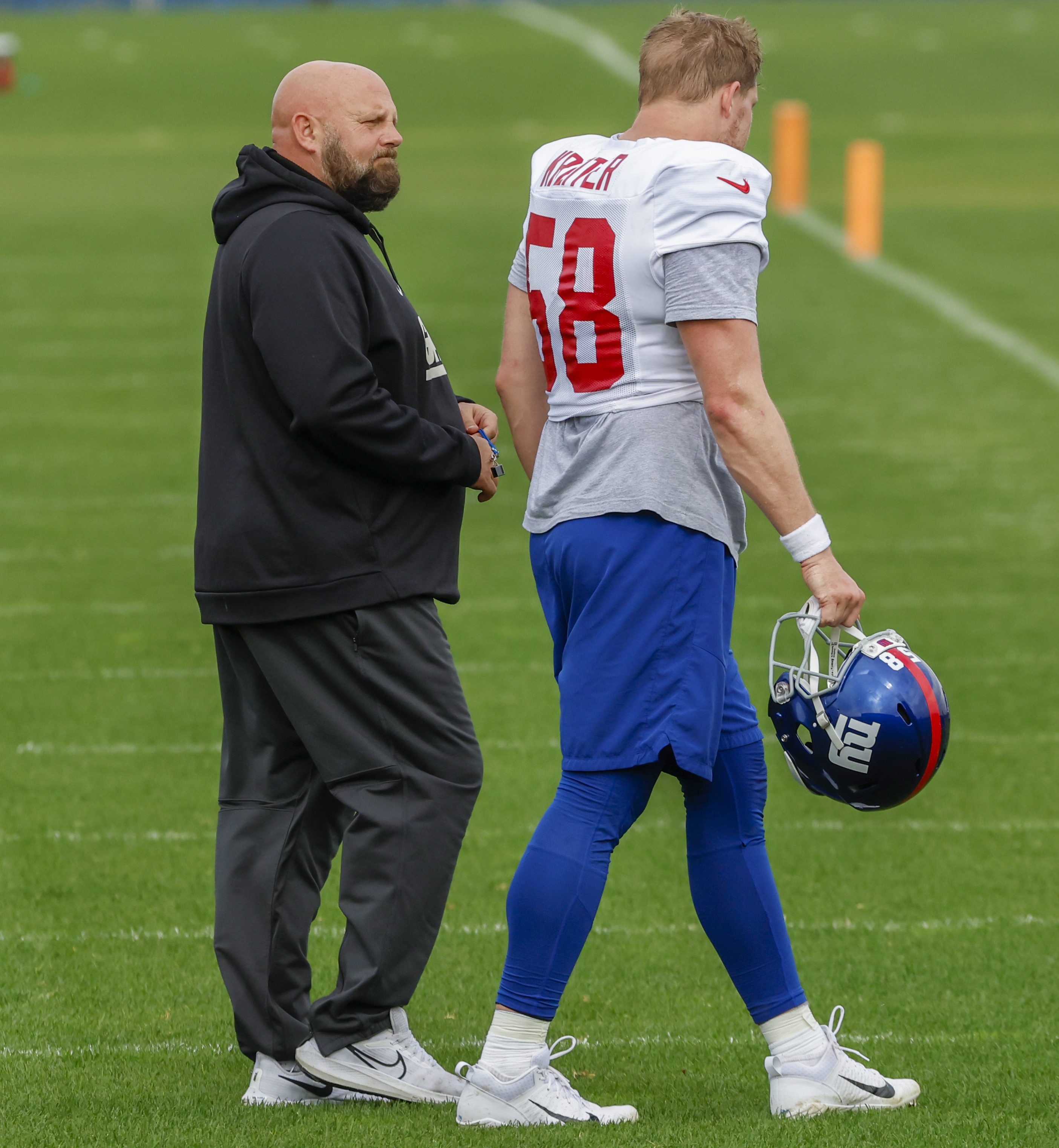New York Giants head coach Brian Daboll (left) and long snapper Casey Kreiter (58) during practice on Wednesday, Oct. 26, 2022. 