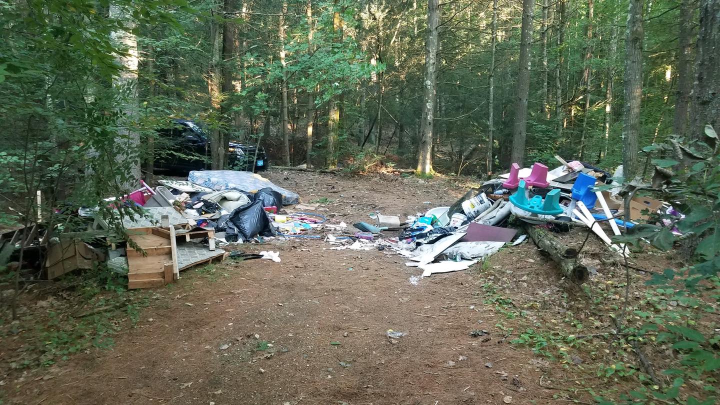 truckloads of dumped household trash in Monson