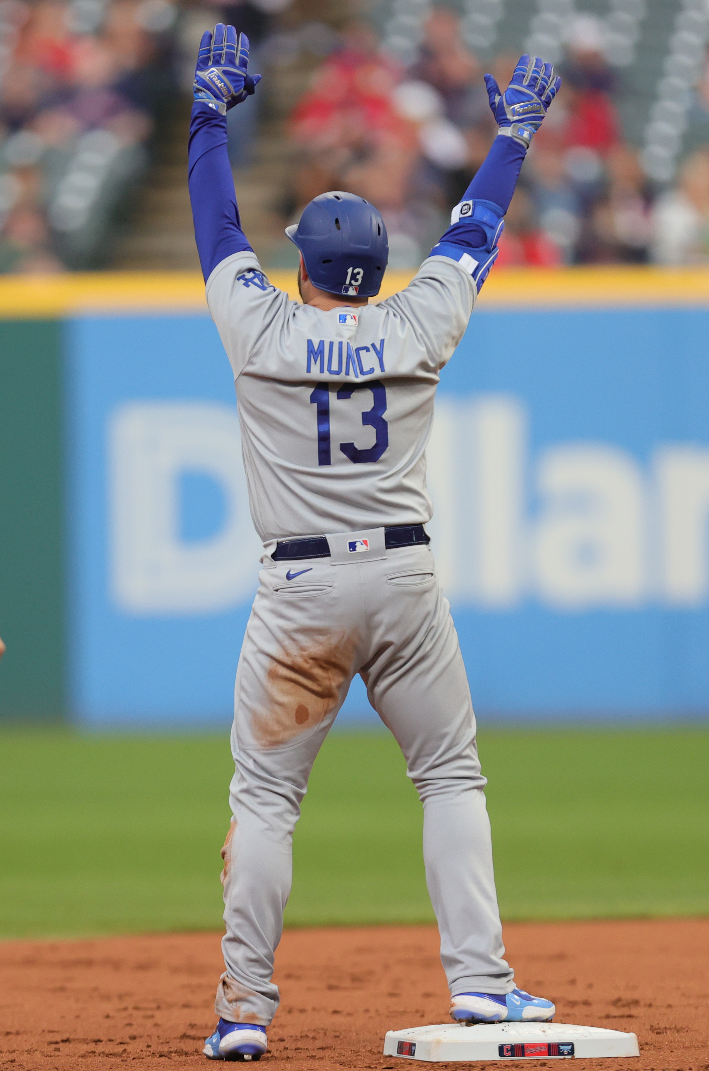 Los Angeles Dodgers' infielder Max Muncy celebrates with teammate