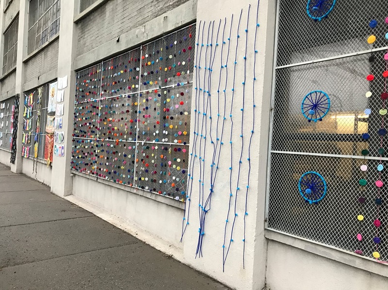 The Topps building in Jersey City decorated with prayer flags.