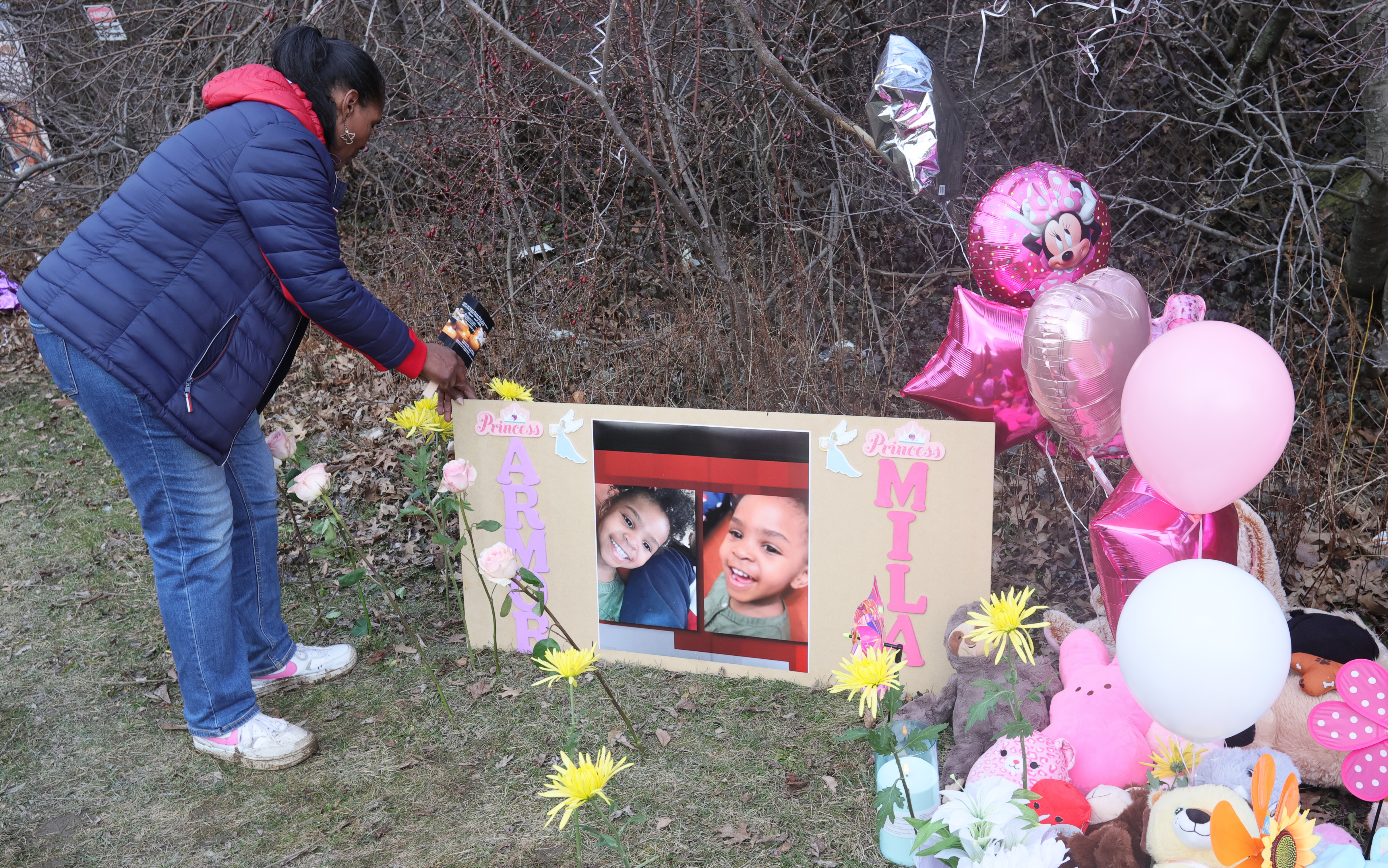 Vigil for sisters Amor Wilson and Mila Chatman at the site where they were  discoverd in a field next to Ginn Academy - cleveland.com