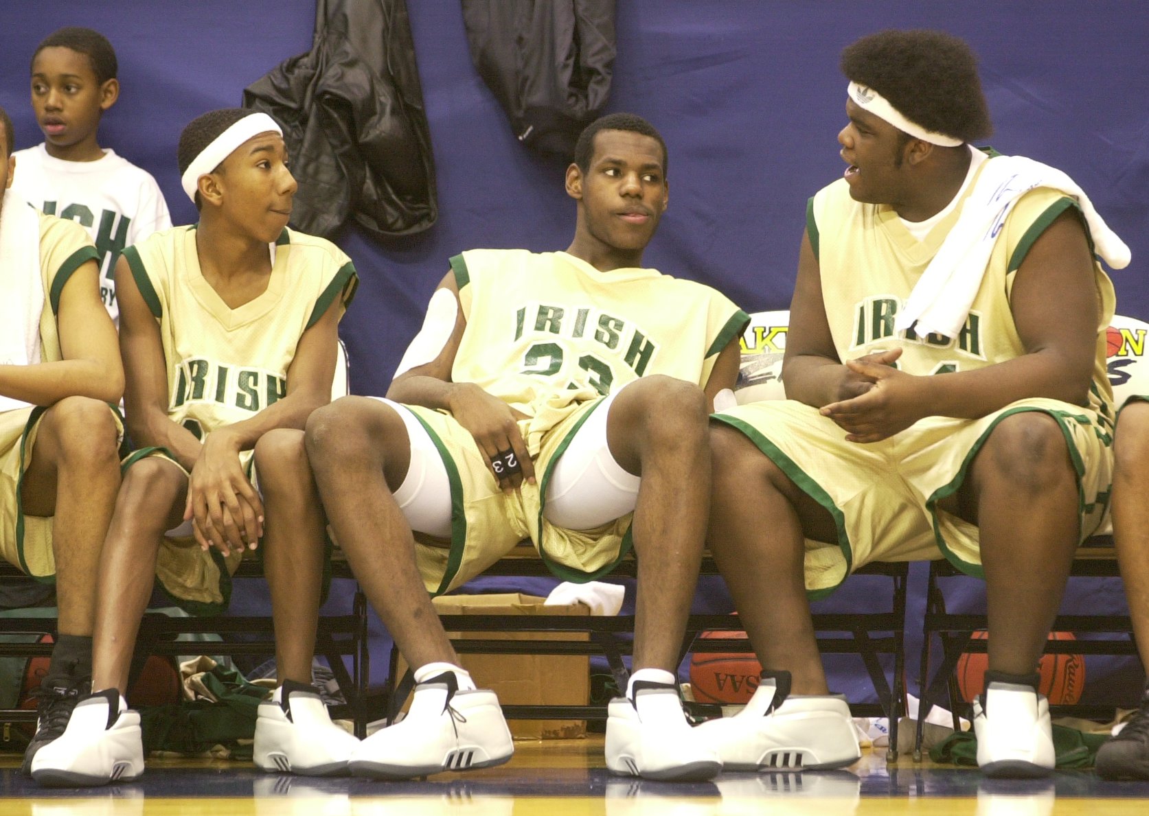 LeBron James sandwiched by two of his best friends, Dru Joyce Jr, left, and Sian Cotton, right.  They were benched as the game against Franklin PA wound to a close last Friday night at the JAR.  Friday January 11, 2002 (bill kennedy/plain dealer)