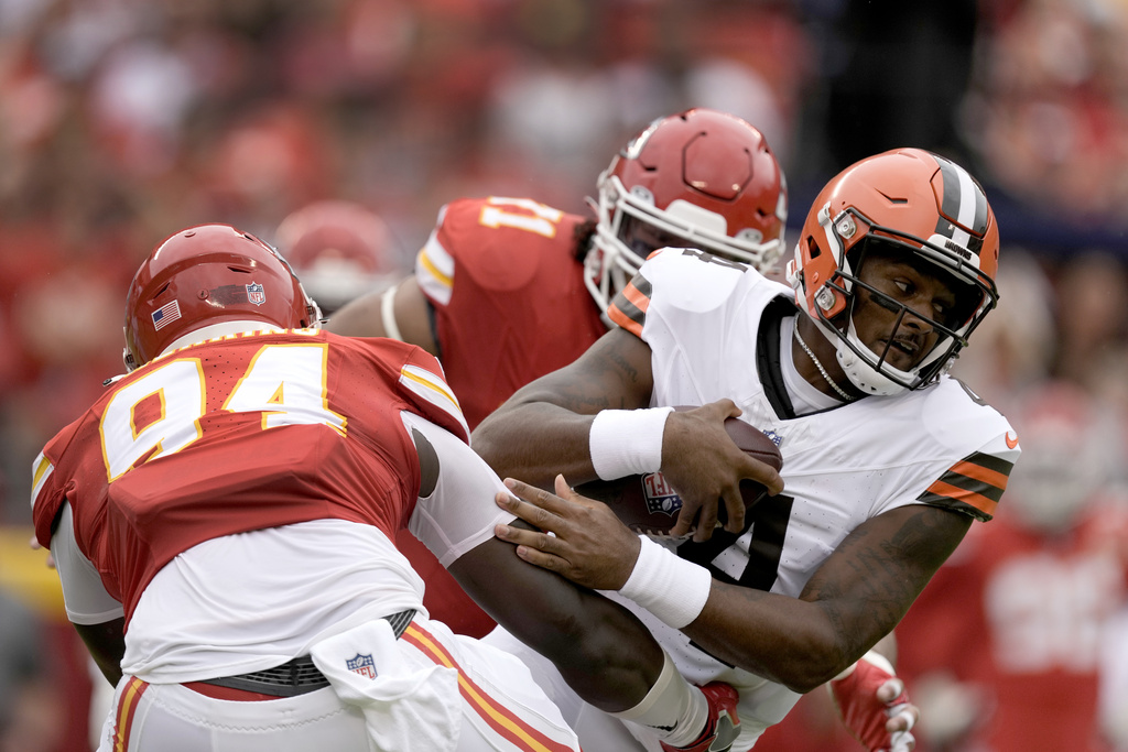 Cleveland Browns defensive end Ogbo Okoronkwo (54) rushes against Kansas  City Chiefs offensive tackle Prince Tega Wanogho (76) during an NFL  preseason football game Saturday, Aug. 26, 2023, in Kansas City, Mo. (