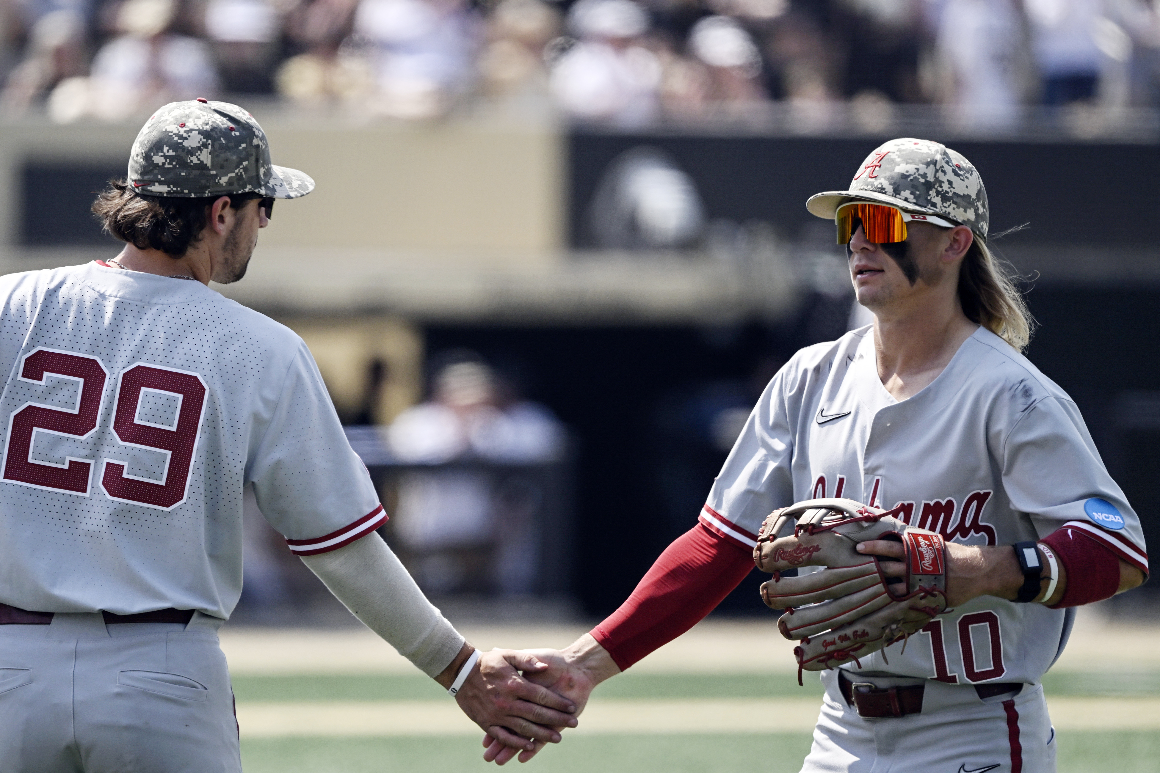 Who are Arkansas vs. NC State baseball umpires in Saturday's NCAA game