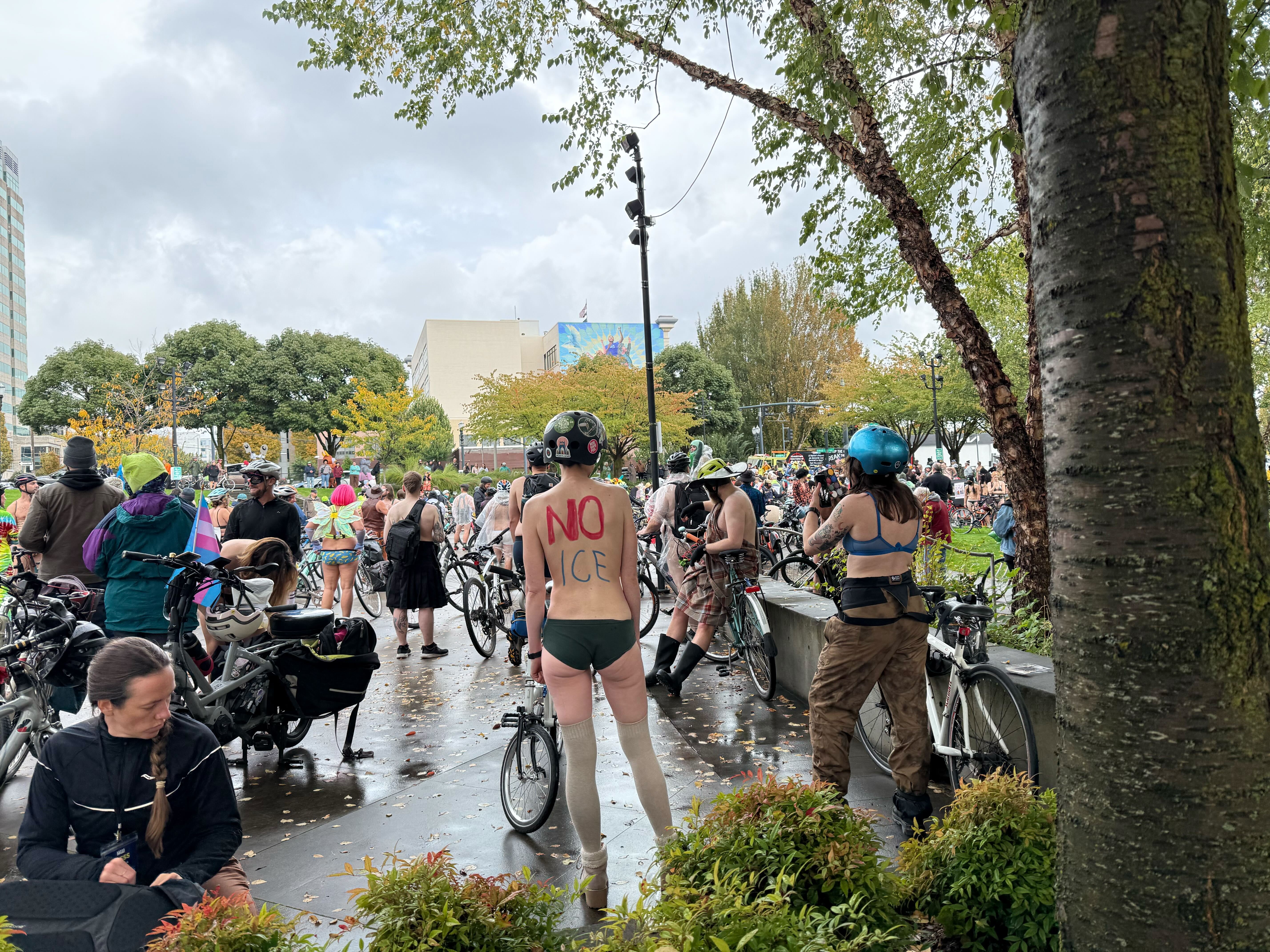 Portland cyclists strip down in pouring rain to protest ICE facility and  Trump troop deployment - oregonlive.com