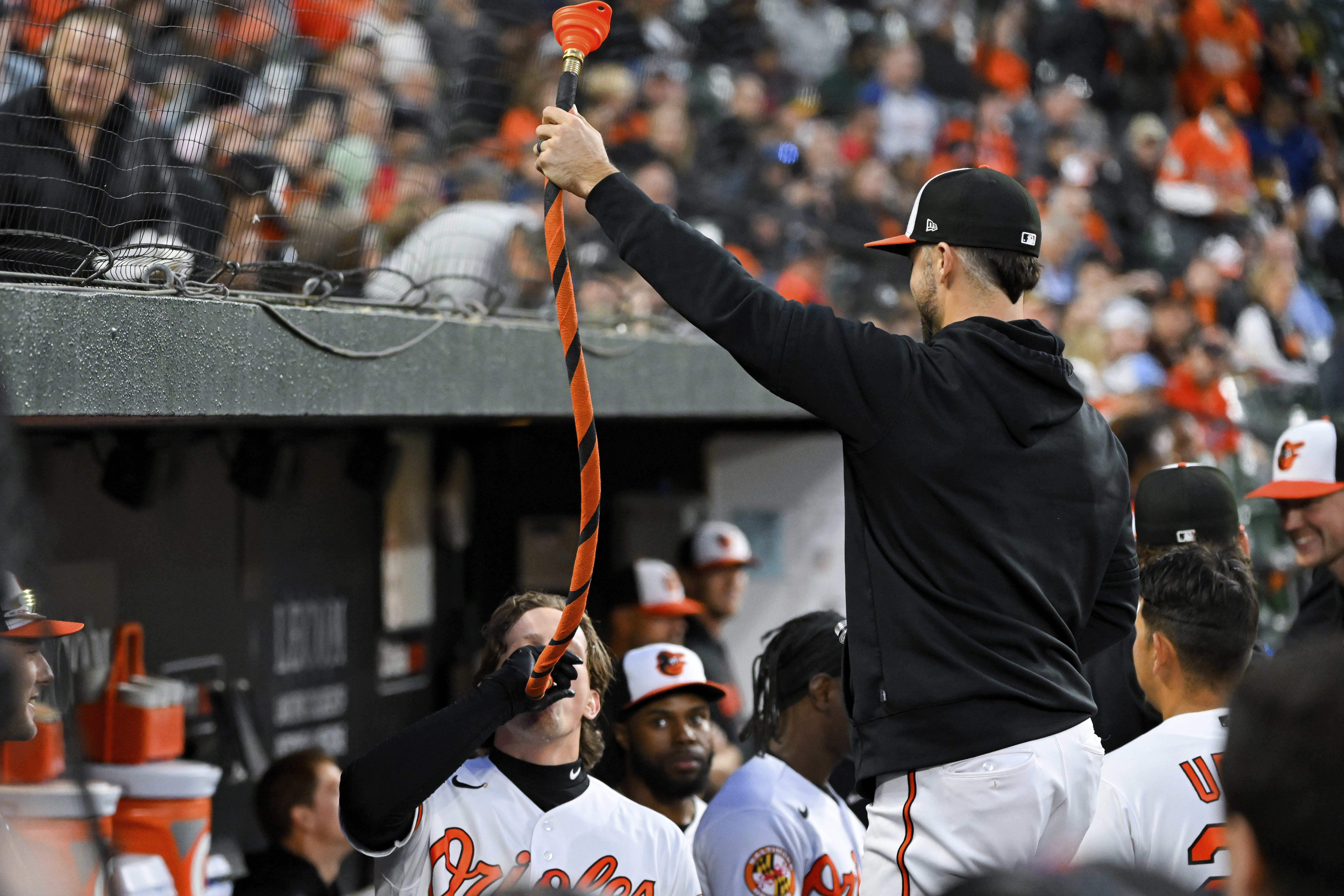 Watch: Former Oregon State star Adley Rutschman chugs from the 'Homer Hose'  during Baltimore Orioles' win 