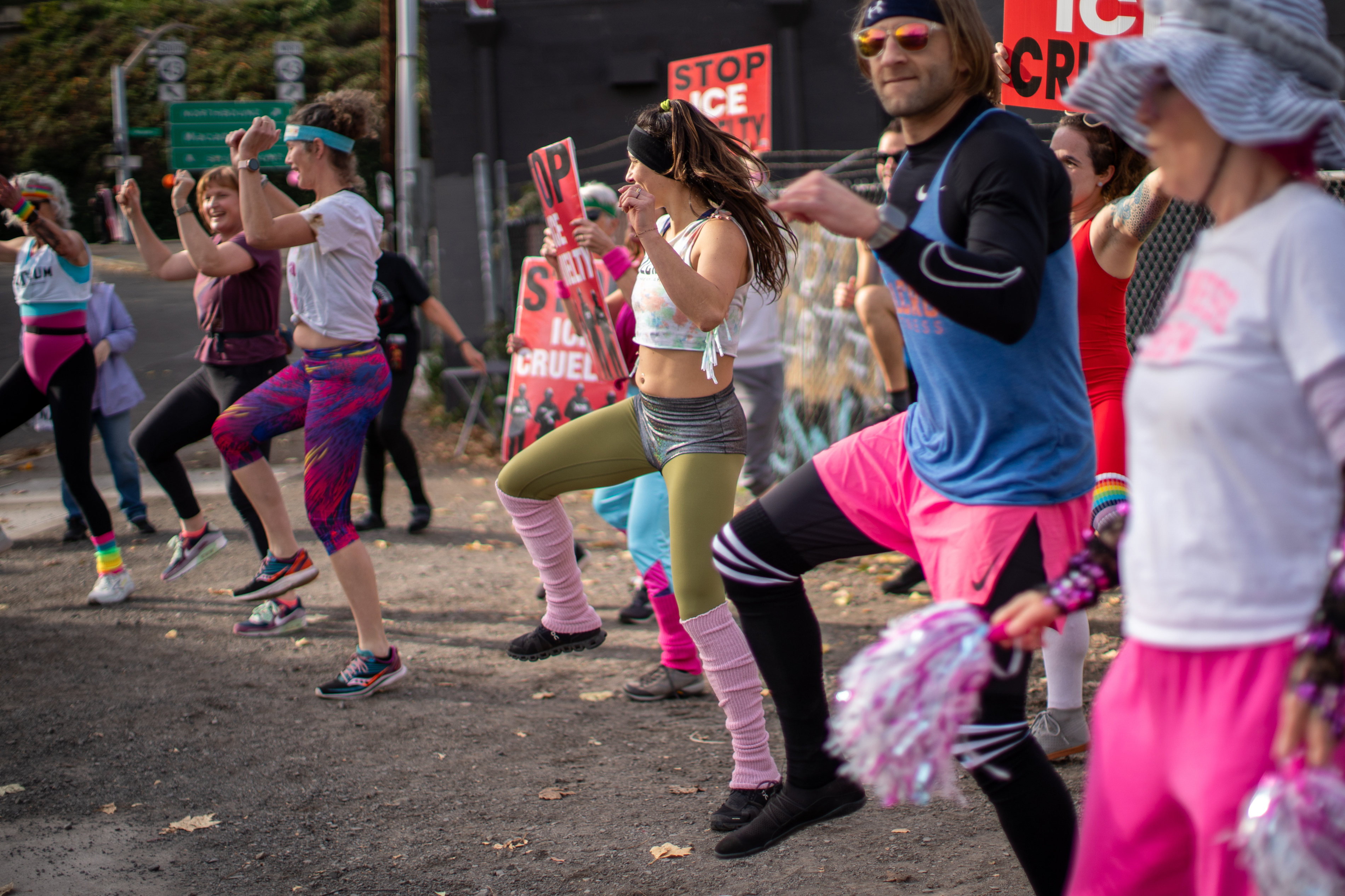 Participants in Fulcrum Fitness’s “Sweatin’ Out the Fascists” held an ’80s-aerobics peaceful protest outside the U.S. Immigration and Customs Enforcement (ICE) facility in South Portland on Sunday, Nov. 9, 2025, collecting donations for the Oregon Food Bank.