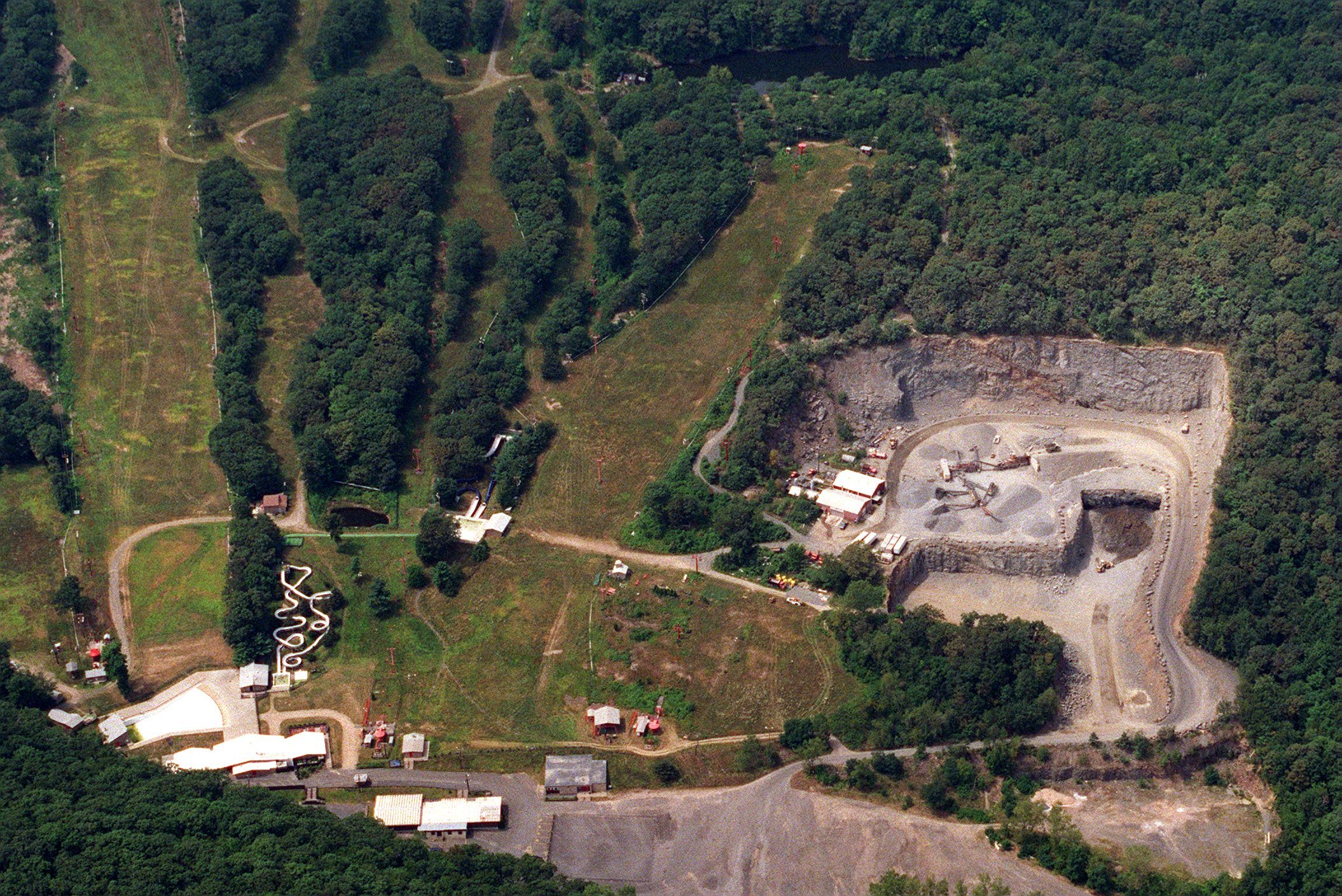 The quarry, shown here in 1998, while it was in operation. When it closed for good in 2012, the quarry crater was much larger. Republican file photo by Christopher Evans