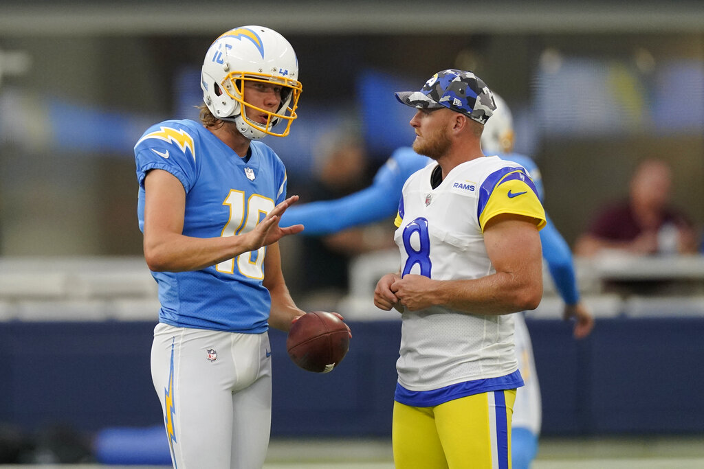 Los Angeles Rams wide receiver Lance McCutcheon, right, is tackled by Los  Angeles Chargers cornerback Michael Davis during the first half of a  preseason NFL football game Saturday, Aug. 13, 2022, in