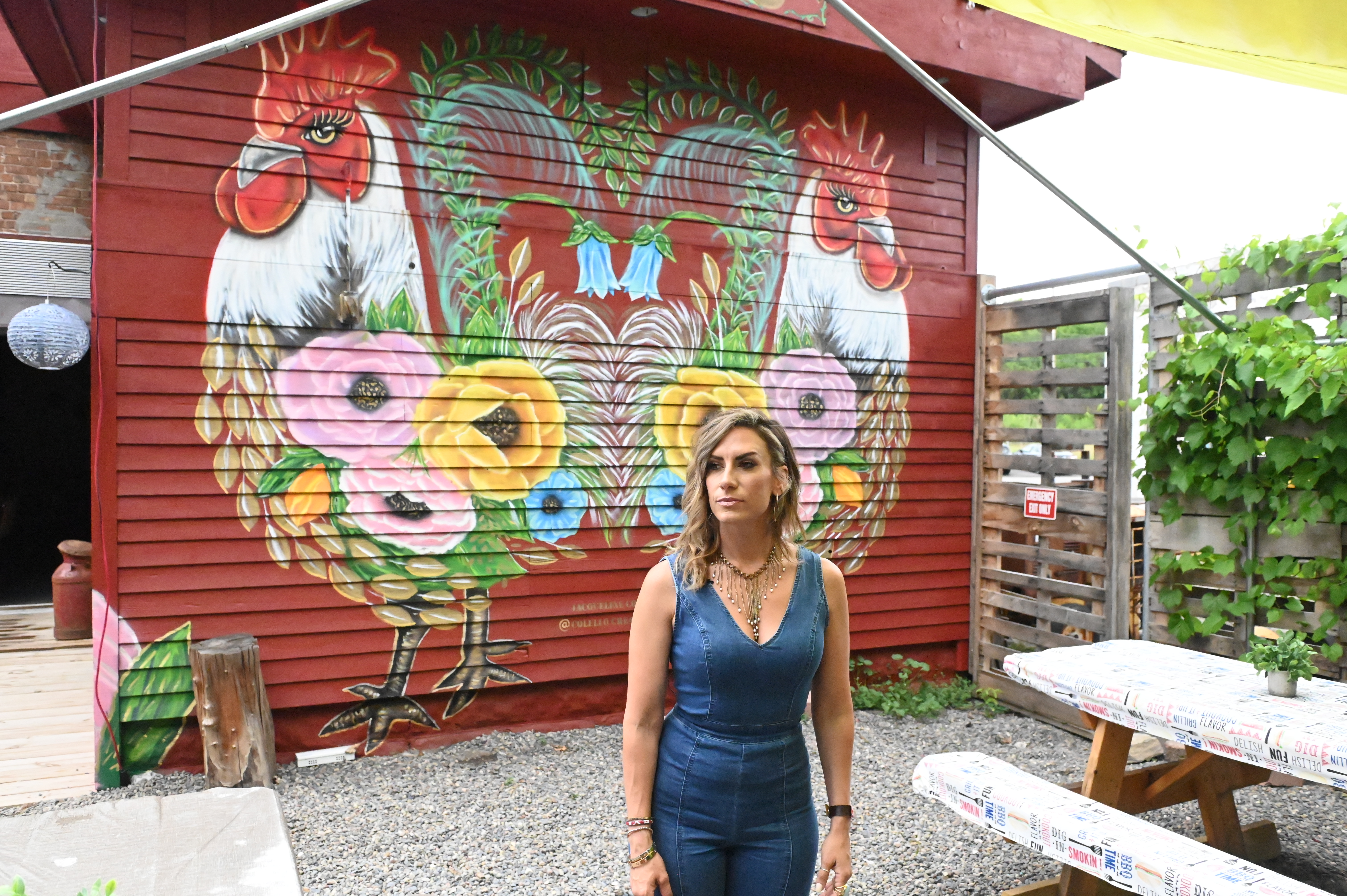 Artist Jacqueline Colello paints three-story mural for Francesca's