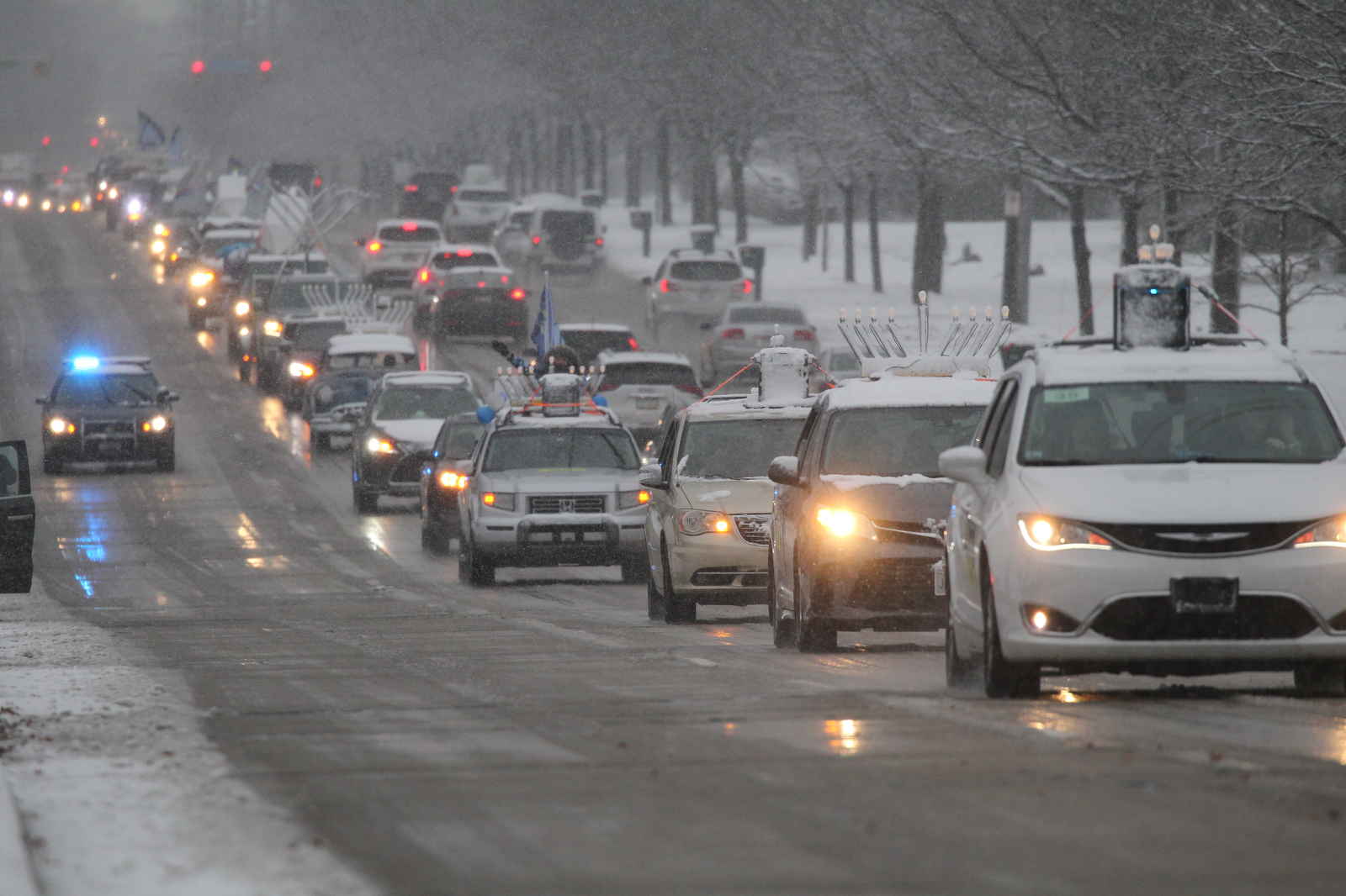 Menorahtopped cars parade through Cleveland eastern suburbs