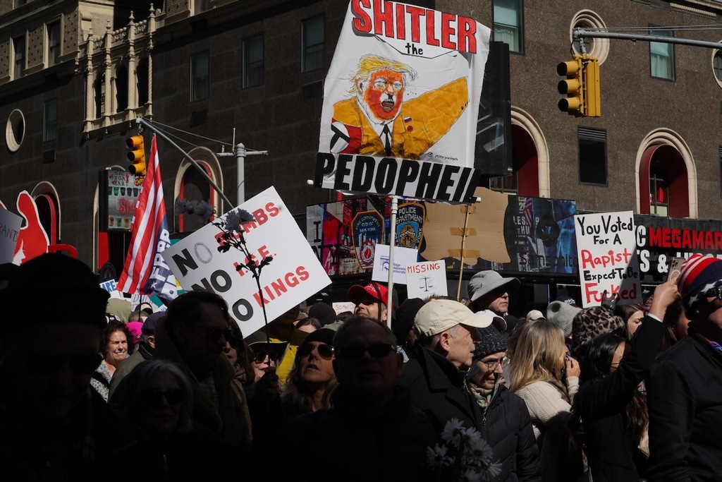 Photos: Tens of thousands march through Times Square in ‘No Kings ...