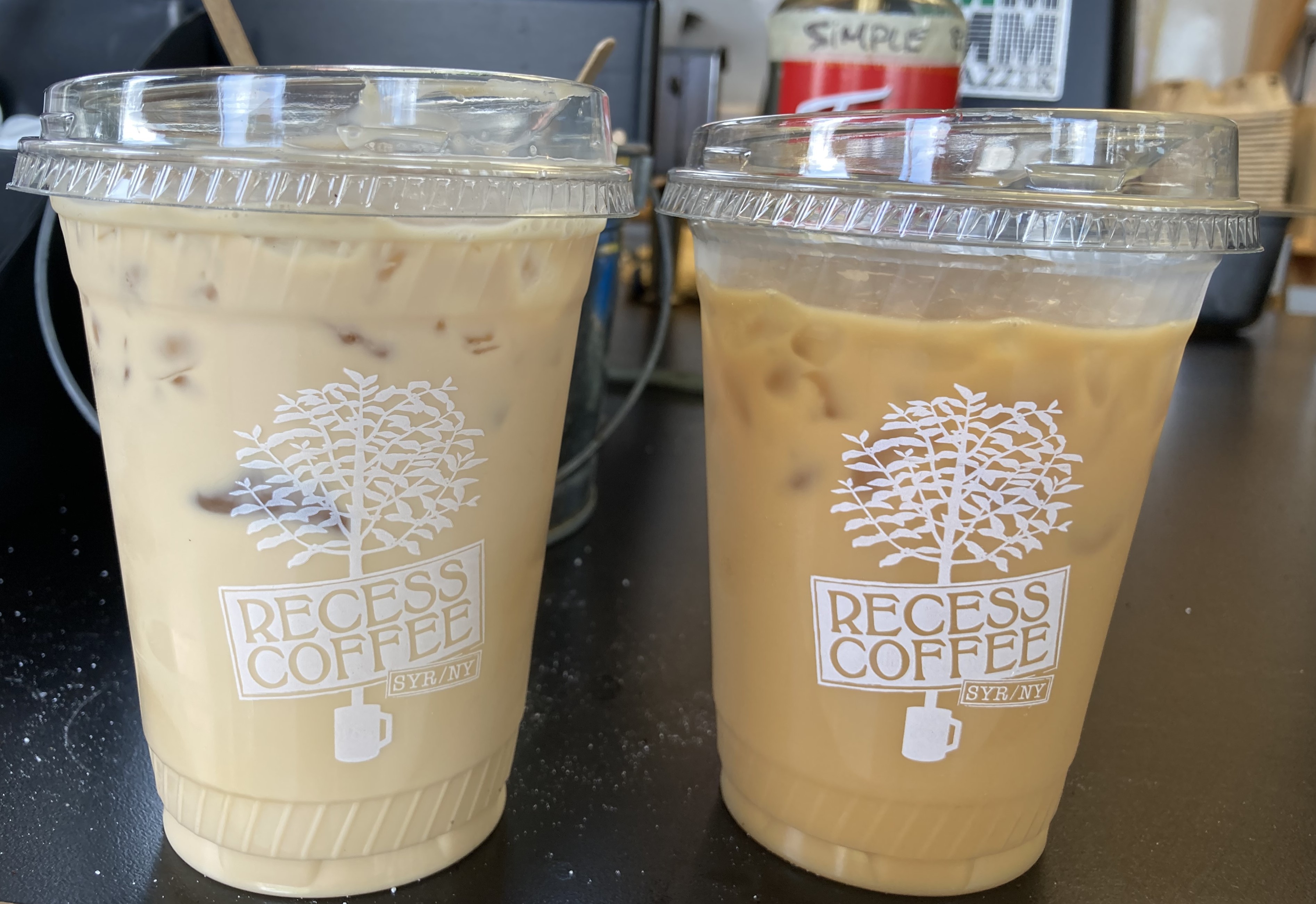 An iced caramel latte and an iced coffee from Recess Coffee.