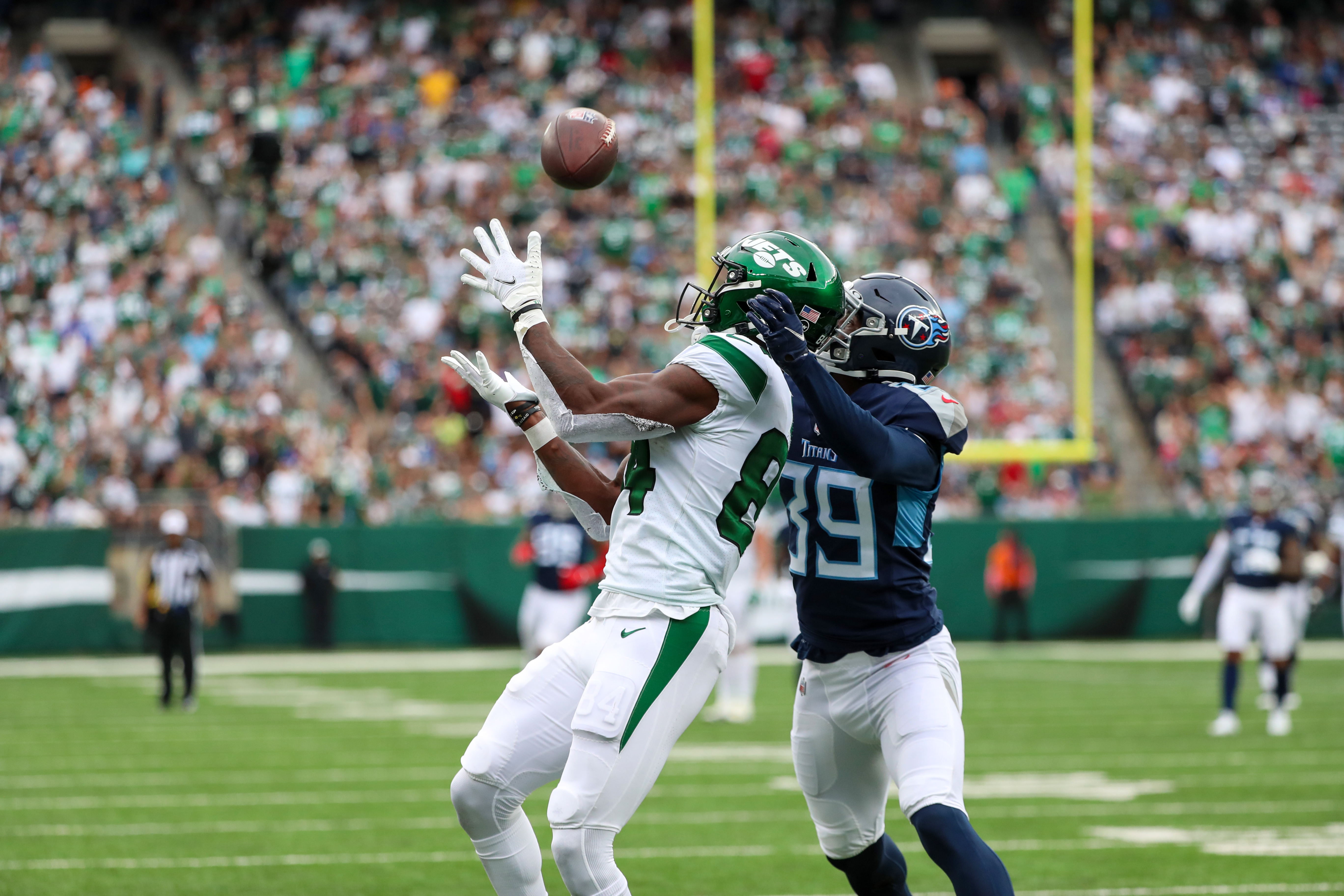 New York Jets wide receiver Corey Davis (84) celebrates after scoring a  touchdown against Tenne …