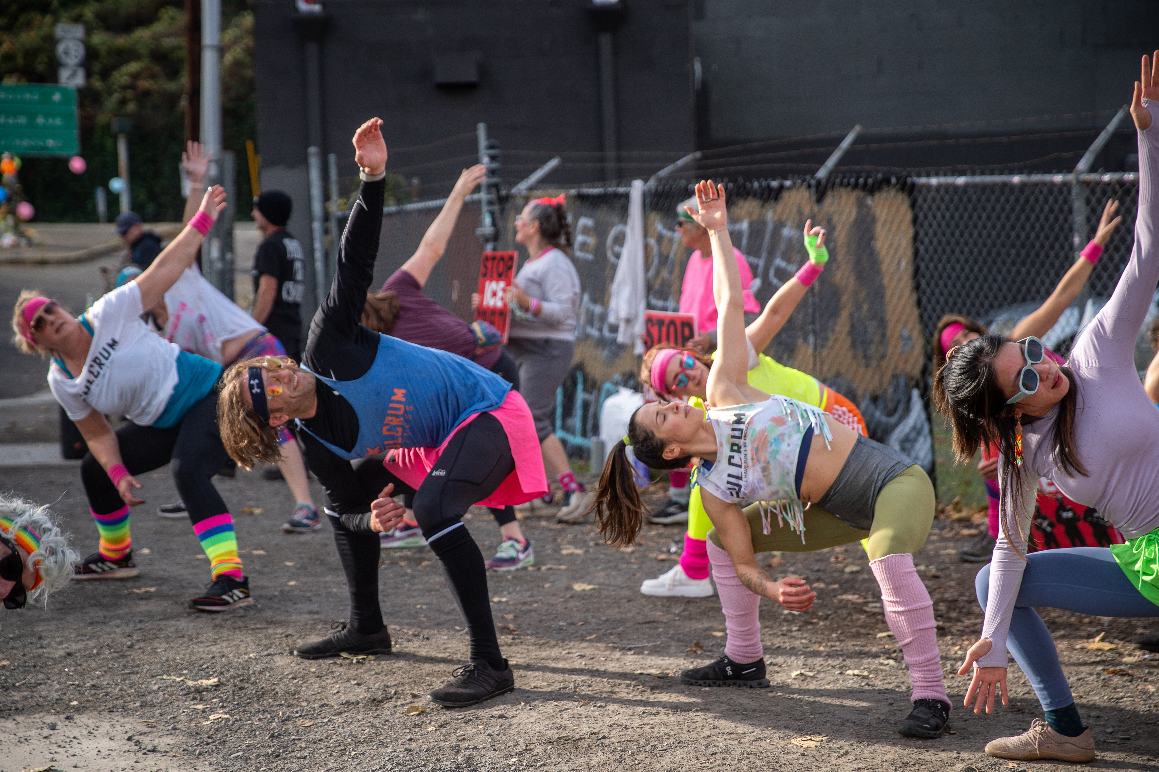 Participants in Fulcrum Fitness’s “Sweatin’ Out the Fascists” held an ’80s-aerobics peaceful protest outside the U.S. Immigration and Customs Enforcement (ICE) facility in South Portland on Sunday, Nov. 9, 2025, collecting donations for the Oregon Food Bank.
