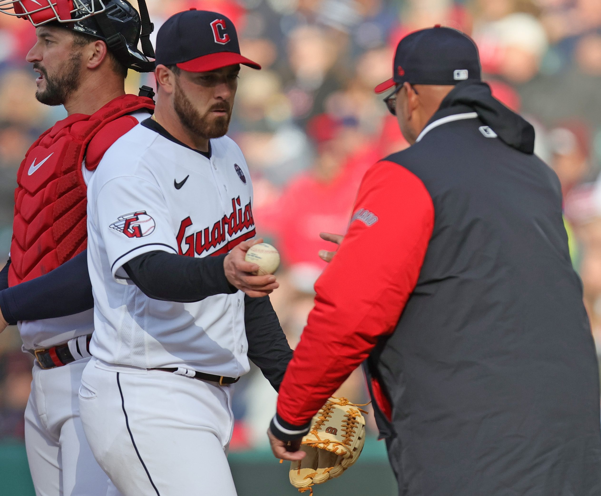 Cleveland Guardians right fielder Will Brennan greets teammates