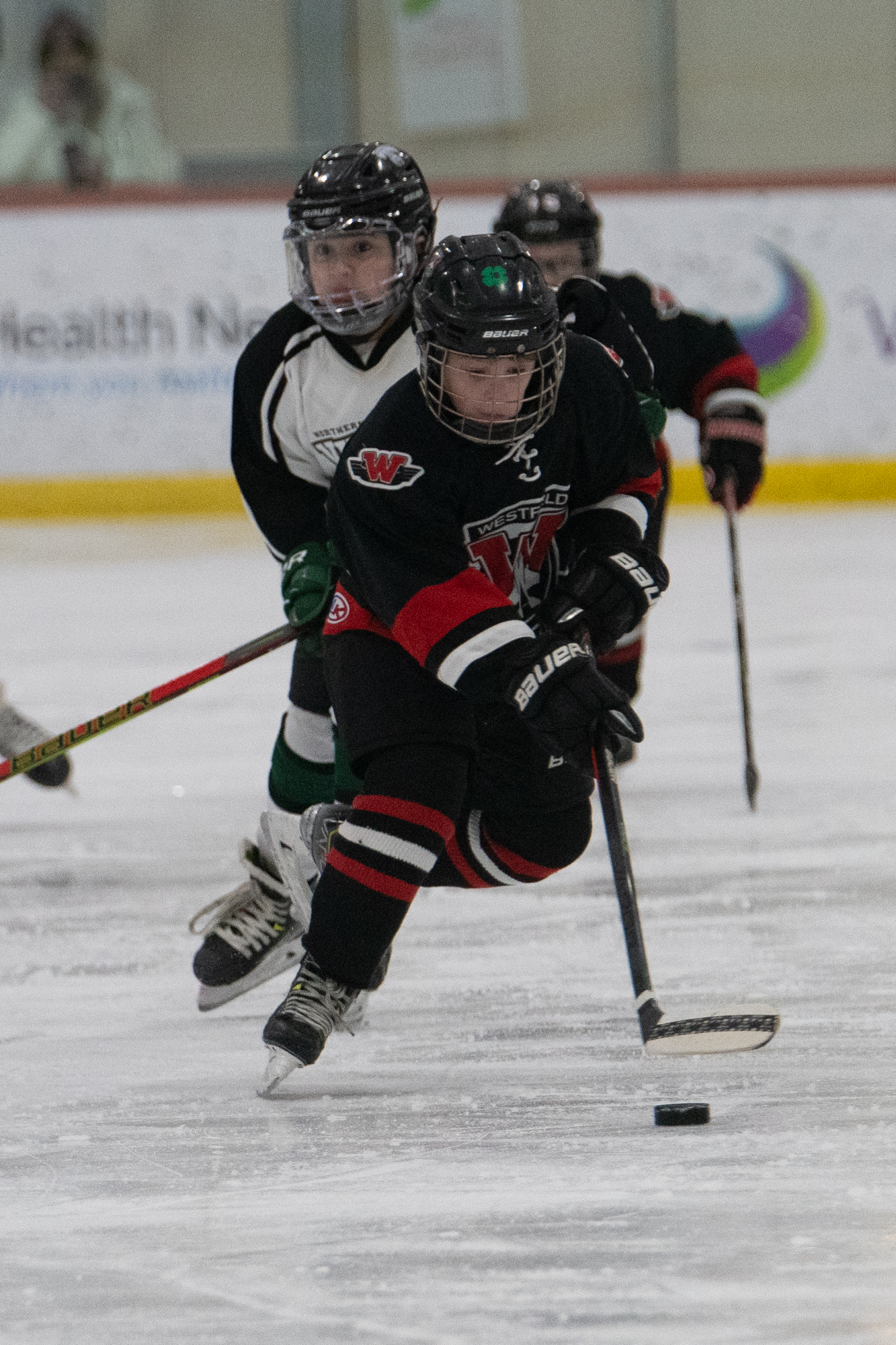 The Westfield Junior Bombers Red battle the Northern Rhode Island Vikings in a Westfield Youth Hockey Fire & Ice Tournament game Sunday at Amelia Park Arena. The game ended in a 2-2 tie. (Bill Deren / The Westfield News)