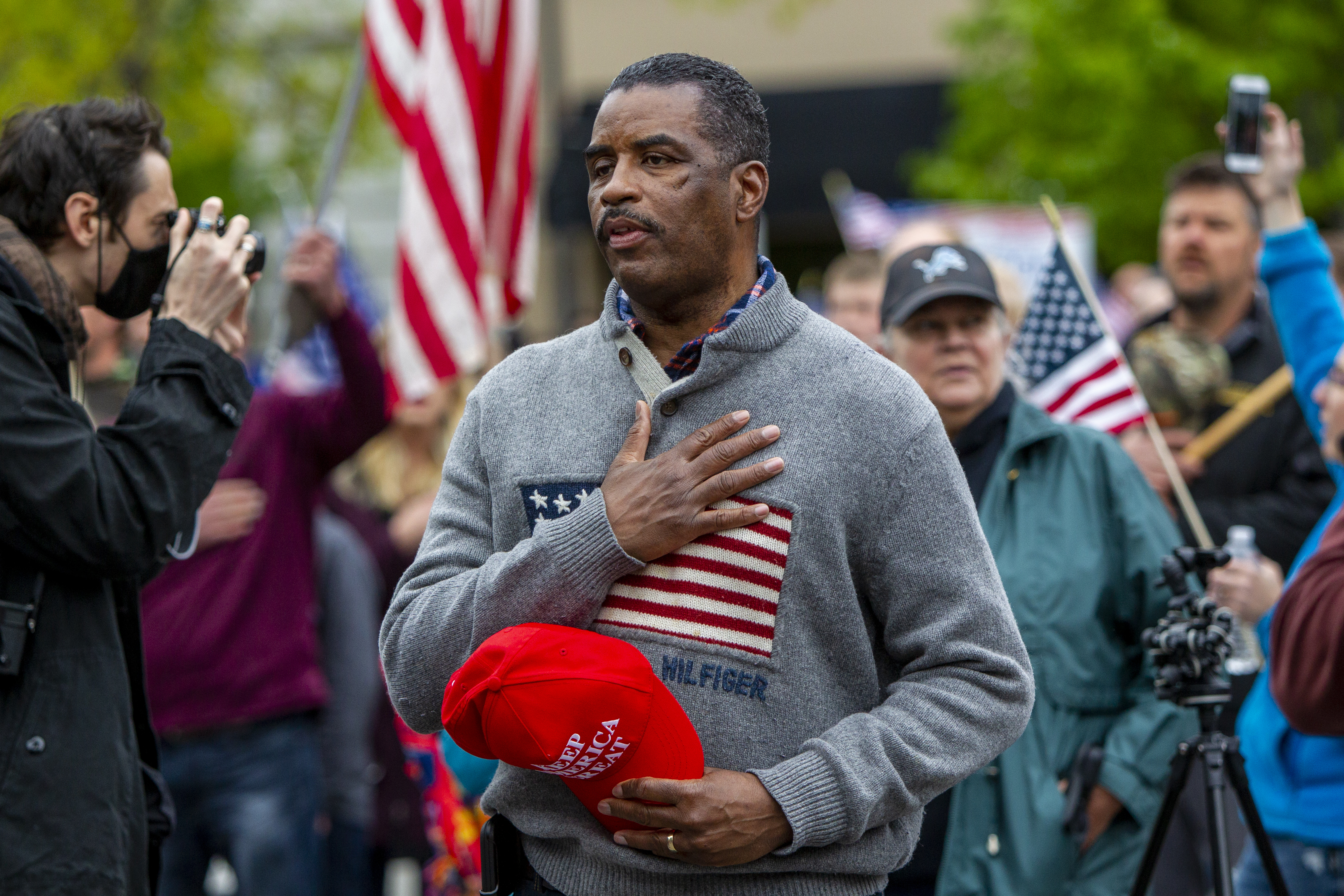 Pastor Philip Smith takes part in the "American Patriot Rally-Sheriffs speak out" event at Rosa Parks Circle in downtown Grand Rapids on Monday, May 18, 2020. The crowd is protesting against Gov. Gretchen Whitmer's stay-at-home order. (Cory Morse | MLive.com)