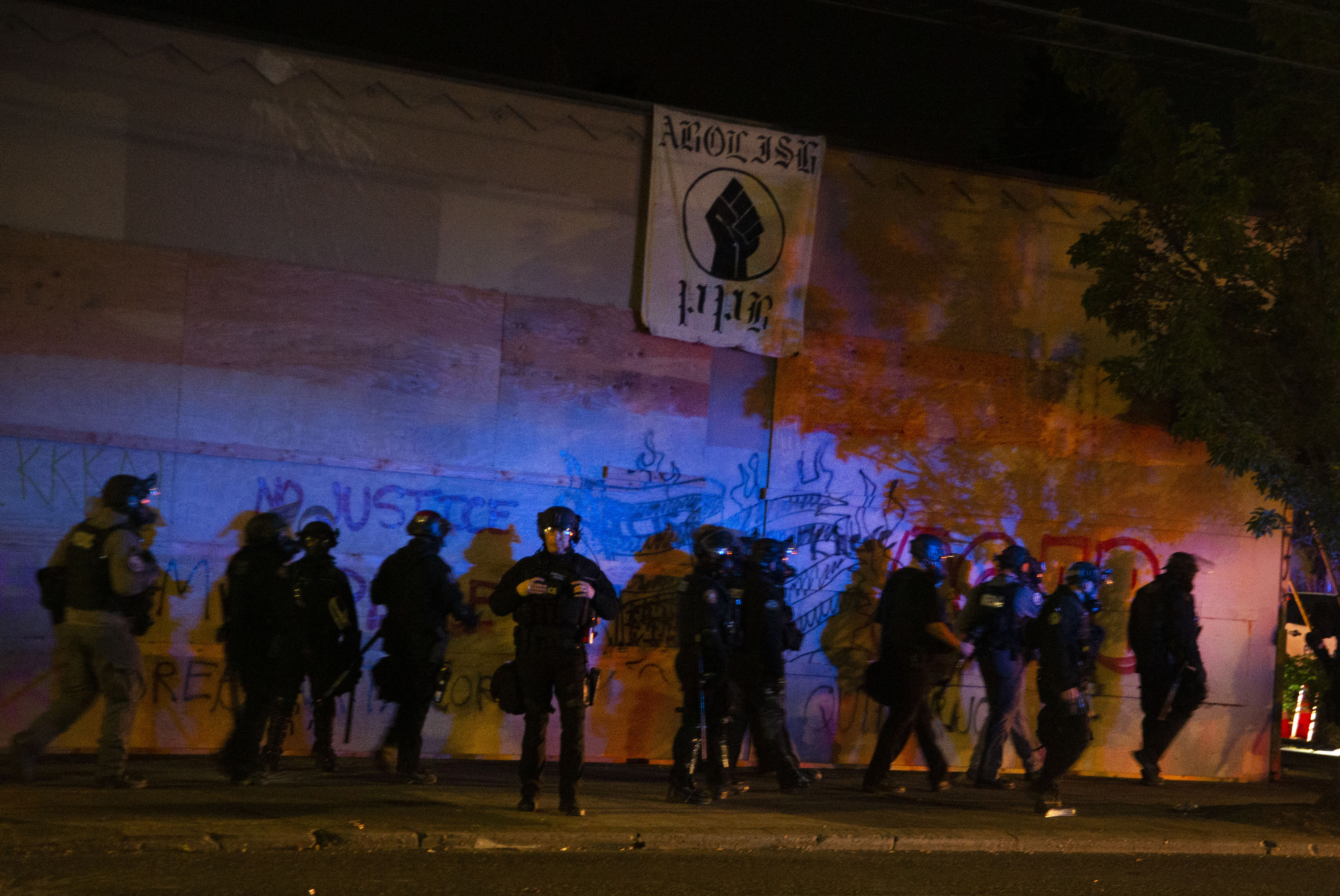 Riot declared as fire set outside Portland police union headquarters ...