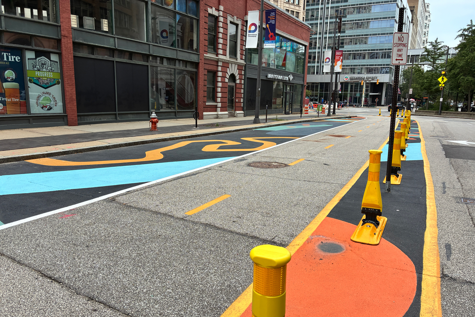 Downtown Cleveland reclaims street space with colorful asphalt