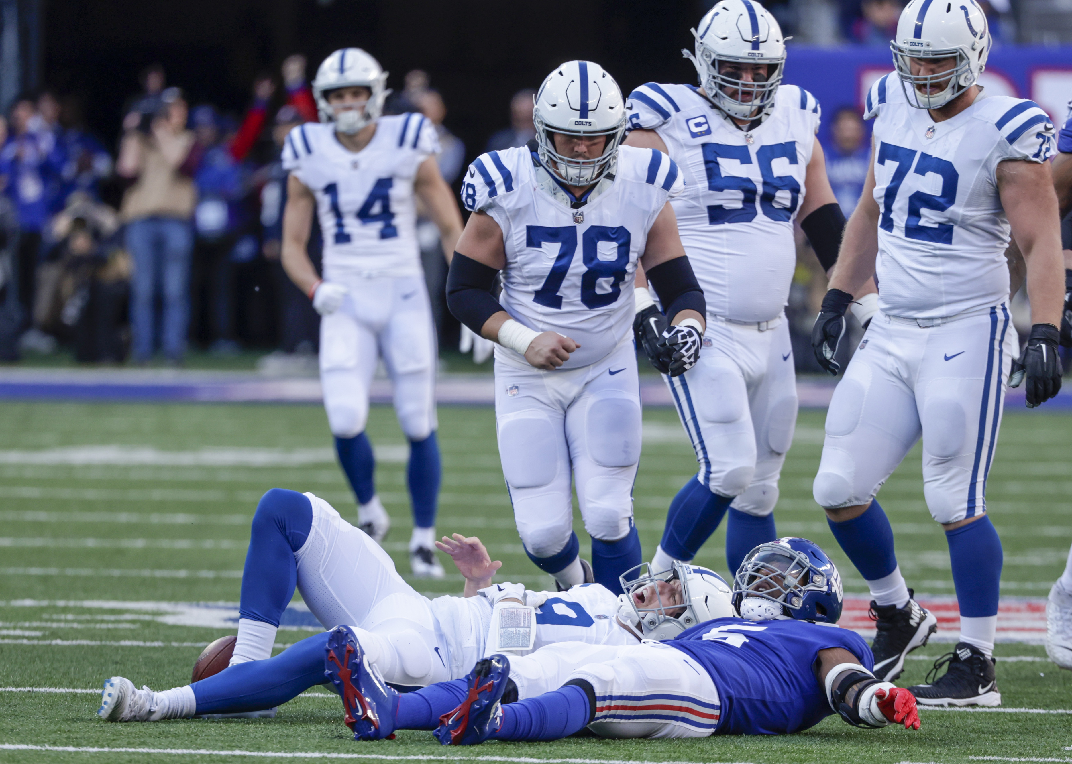 Giants' Kayvon Thibodeaux celebrates sack as Colts' Nick Foles writhes in  pain