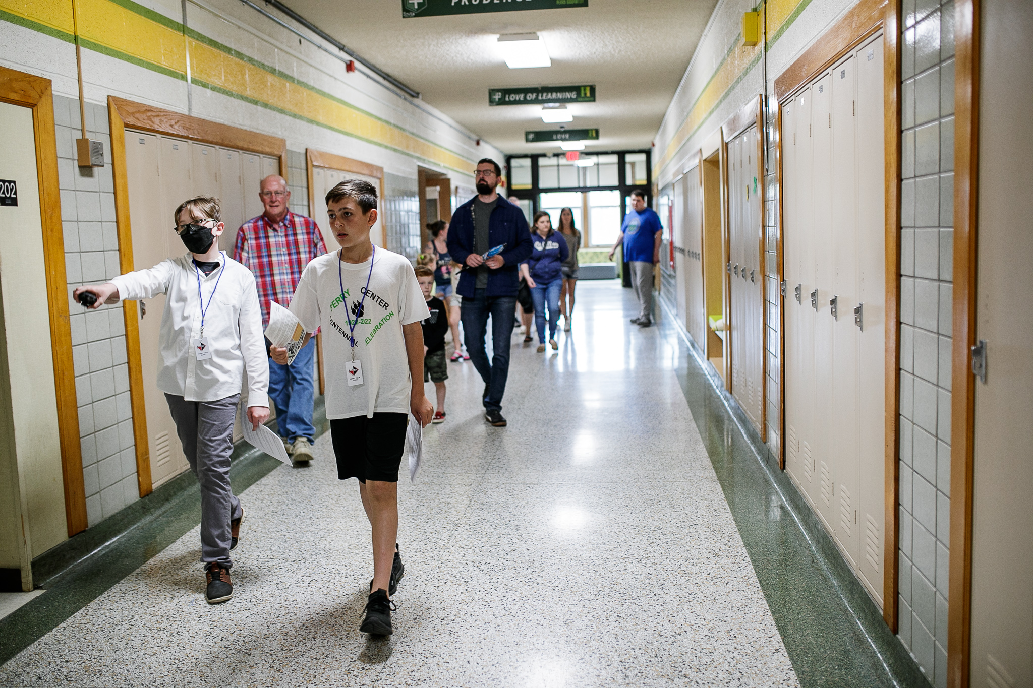 Students at Perry Center gave guided tours to the building during the Perry Center Centennial Event in Grand Blanc on Saturday, May 14, 2022. (Jenifer Veloso | MLive.com)