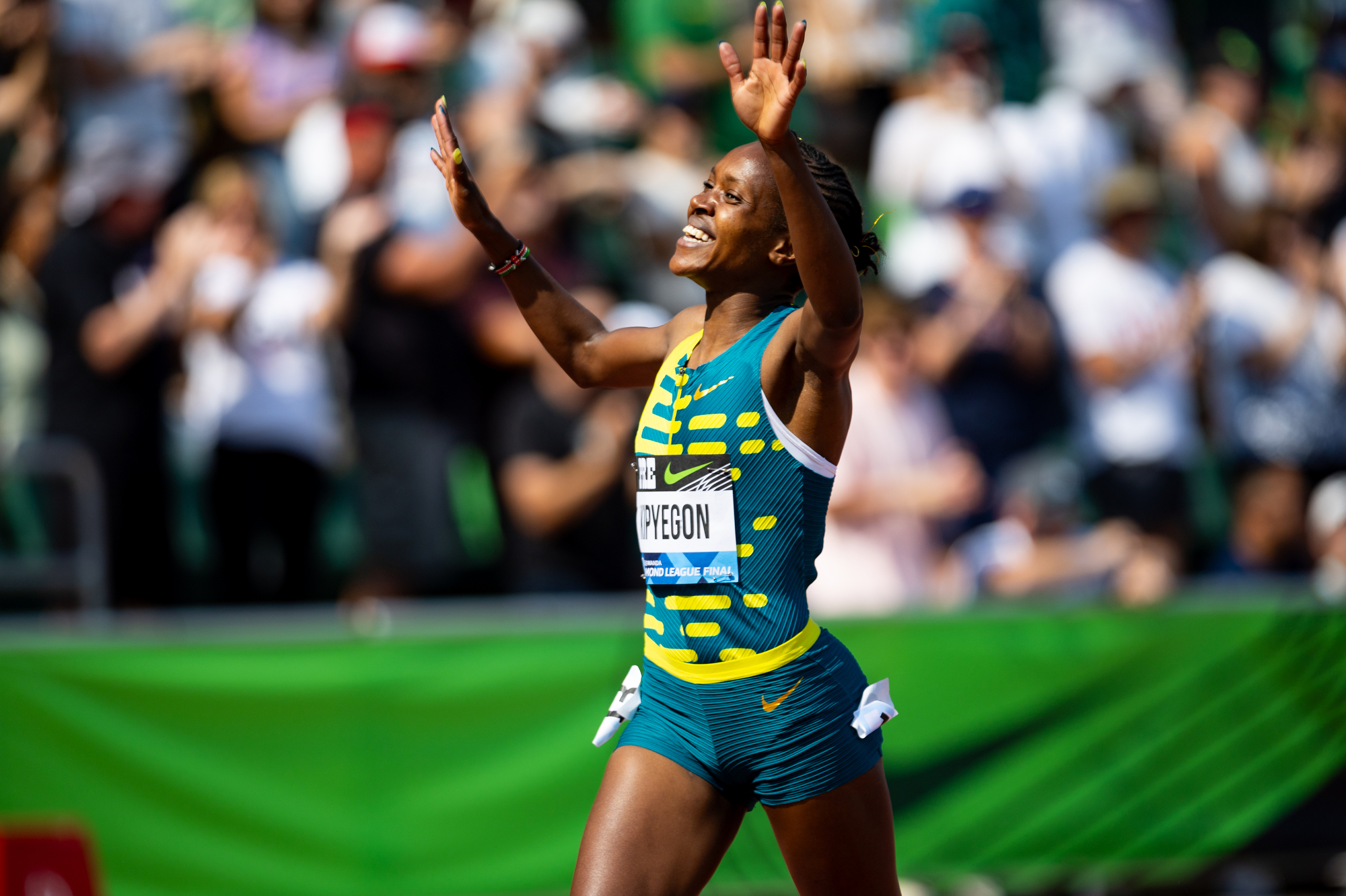 Faith Kipyegon of Kenya celebrates as she wins the women’s 1,500 meters at the Prefontaine Classic track and field meet on Saturday, Sept. 16, 2023, at Hayward Field in Eugene.