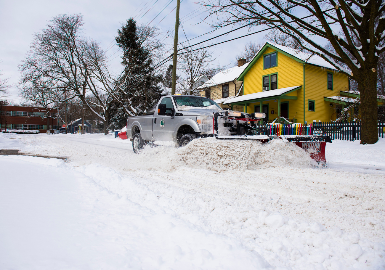 Ann Arbor residents shovel out their driveways and sled ride on Tuesday