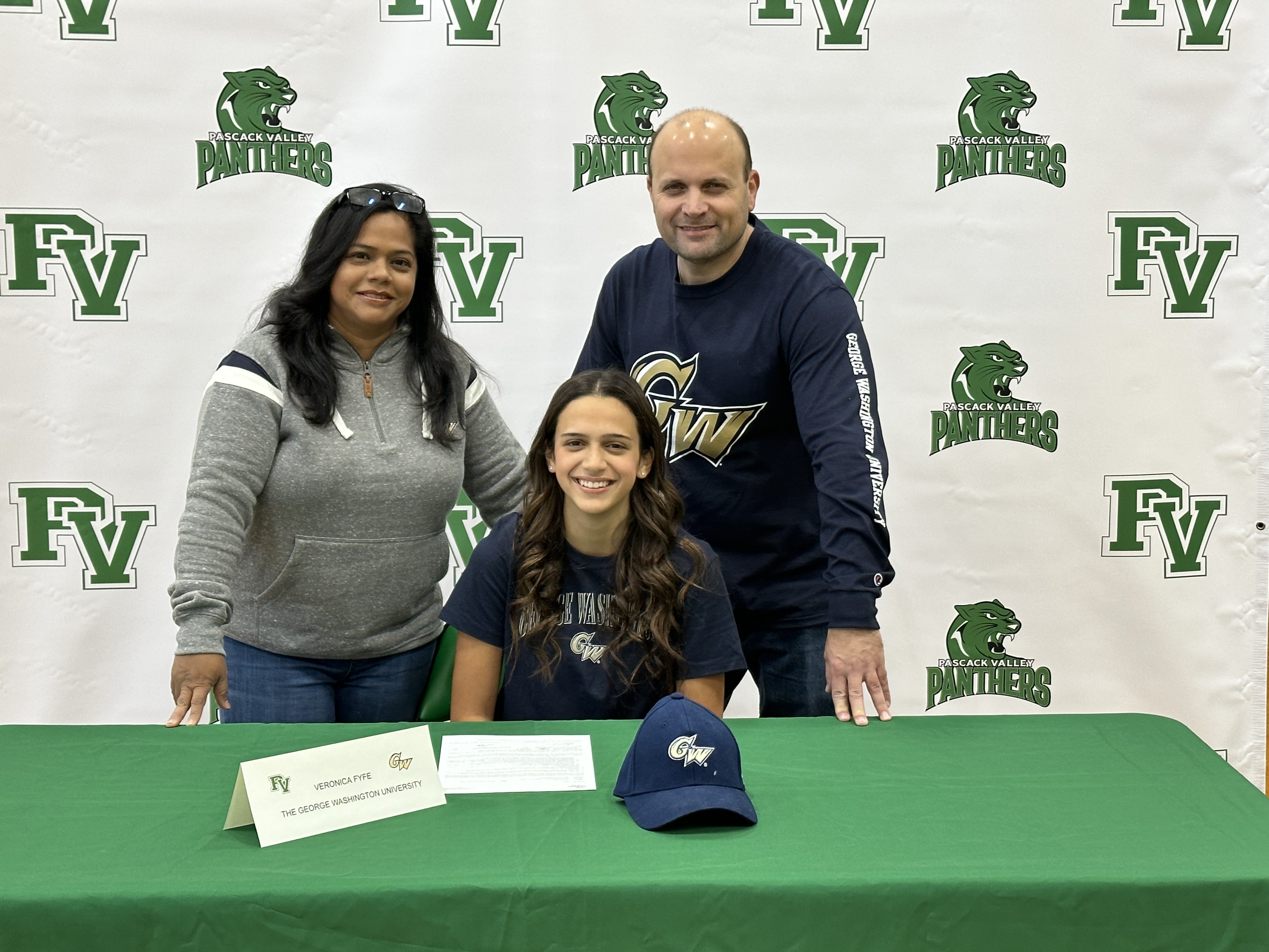 Pascack Valley's Veronica Fyfe signs with George Washington Diving along side her parents, Dora and Robert