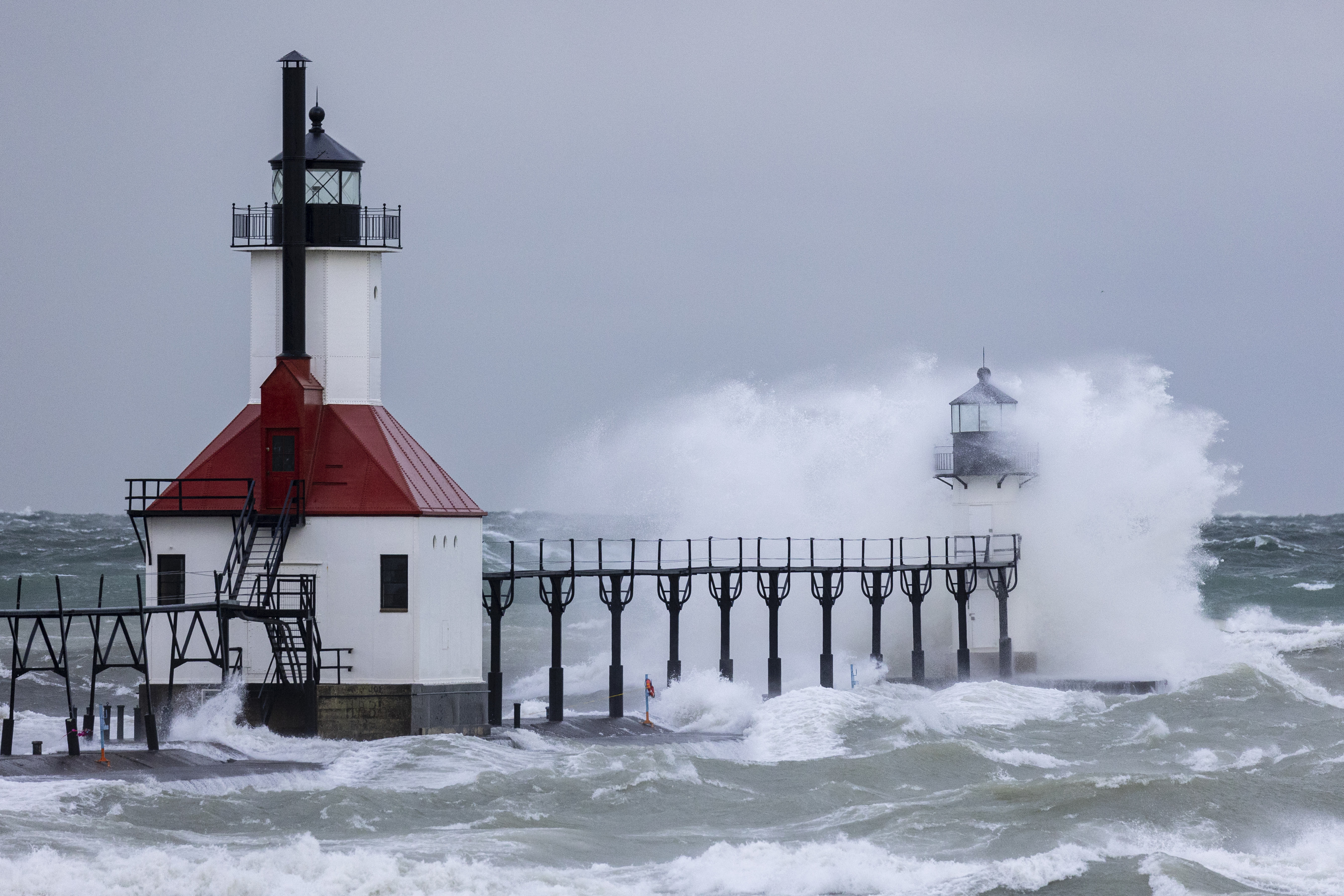 Massive waves topping 15 feet smash into Lake Michigan lighthouses 
