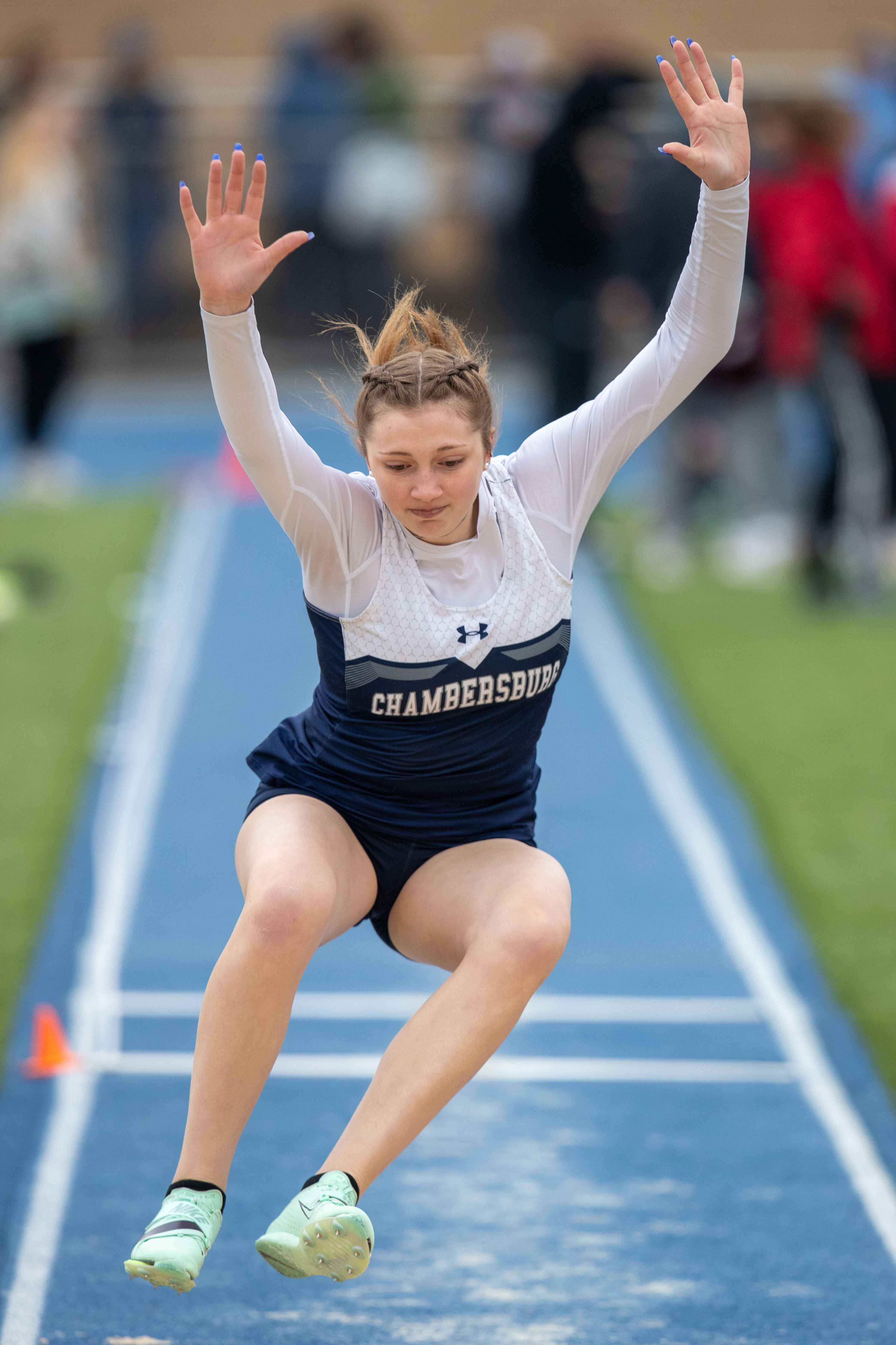 Chambersburg’s Kate Etter triple jumps at the 2023 Tim Cook Memorial Invitational track & field meet at Chambersburg, Pa., Mar. 25, 2023. She finished second with a jump of 33-4.75.Mark Pynes | pennlive.com