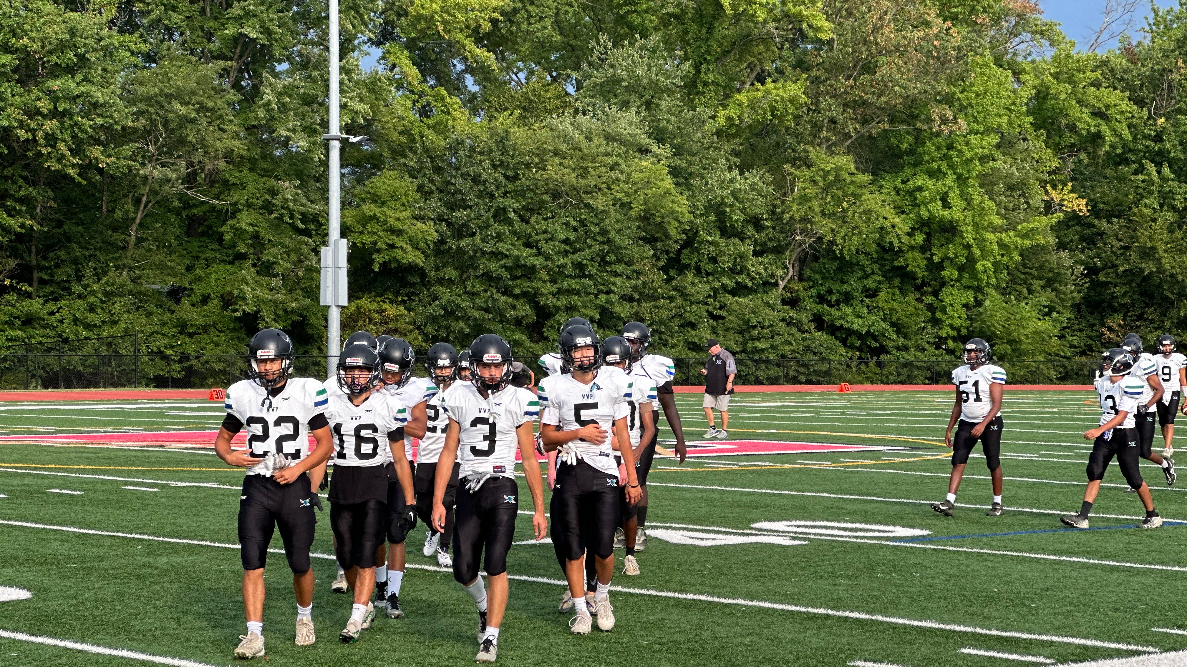 Warren's Undefeated Football Team Wins League Title