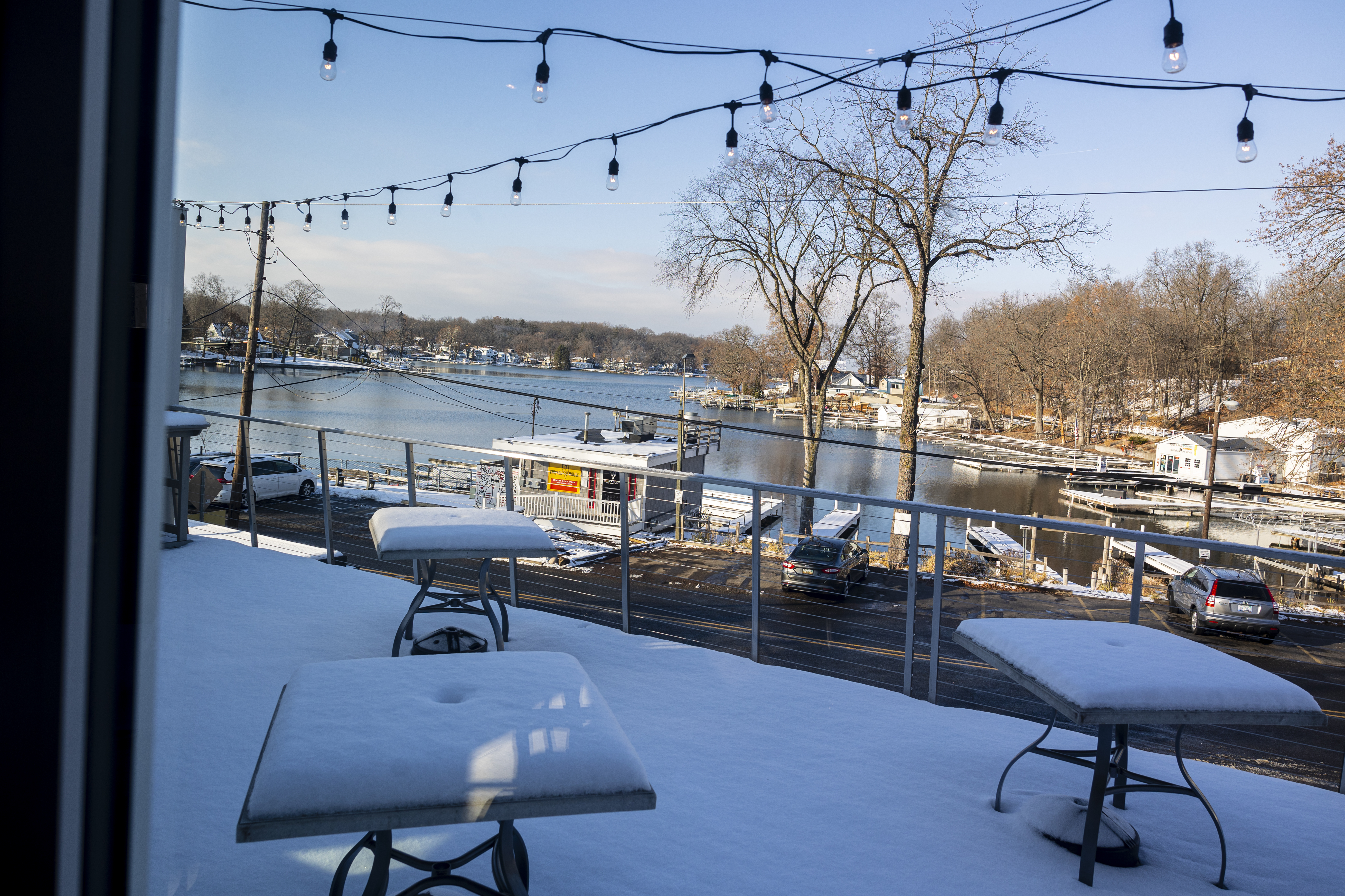 The seasonal patio at Compass and Cleaver with view of the south end of Gull Lake in 12454 E D Ave. in Richland, Michigan.
