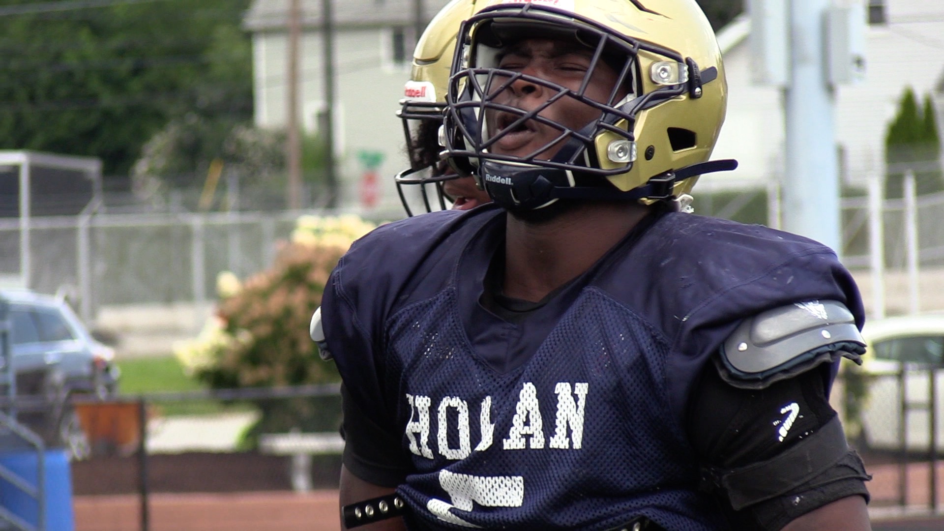 Canton native Dominque Robinsons speaks to McKinley football team