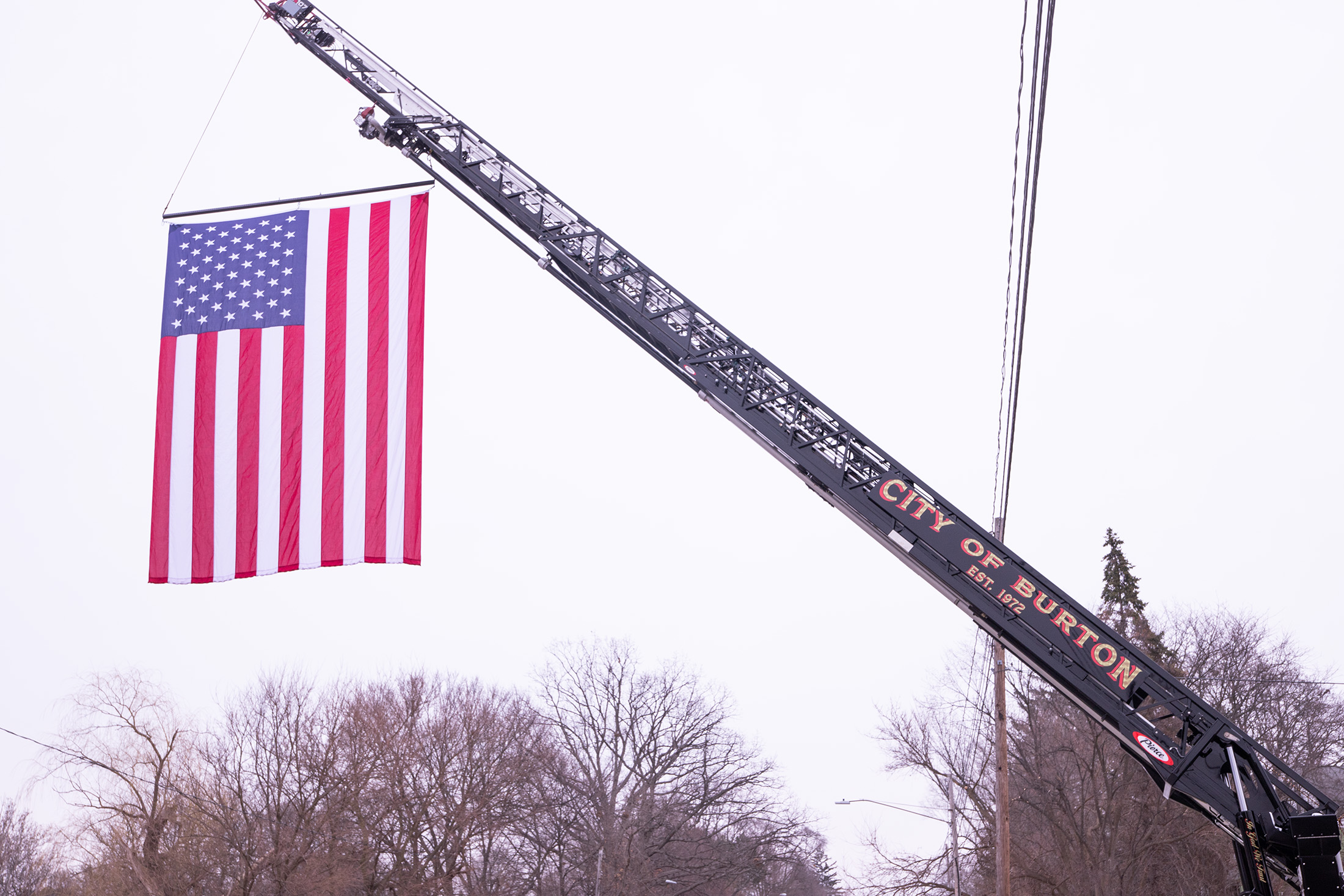 Funeral Procession Takes Place Through City To Honor Fallen Flint