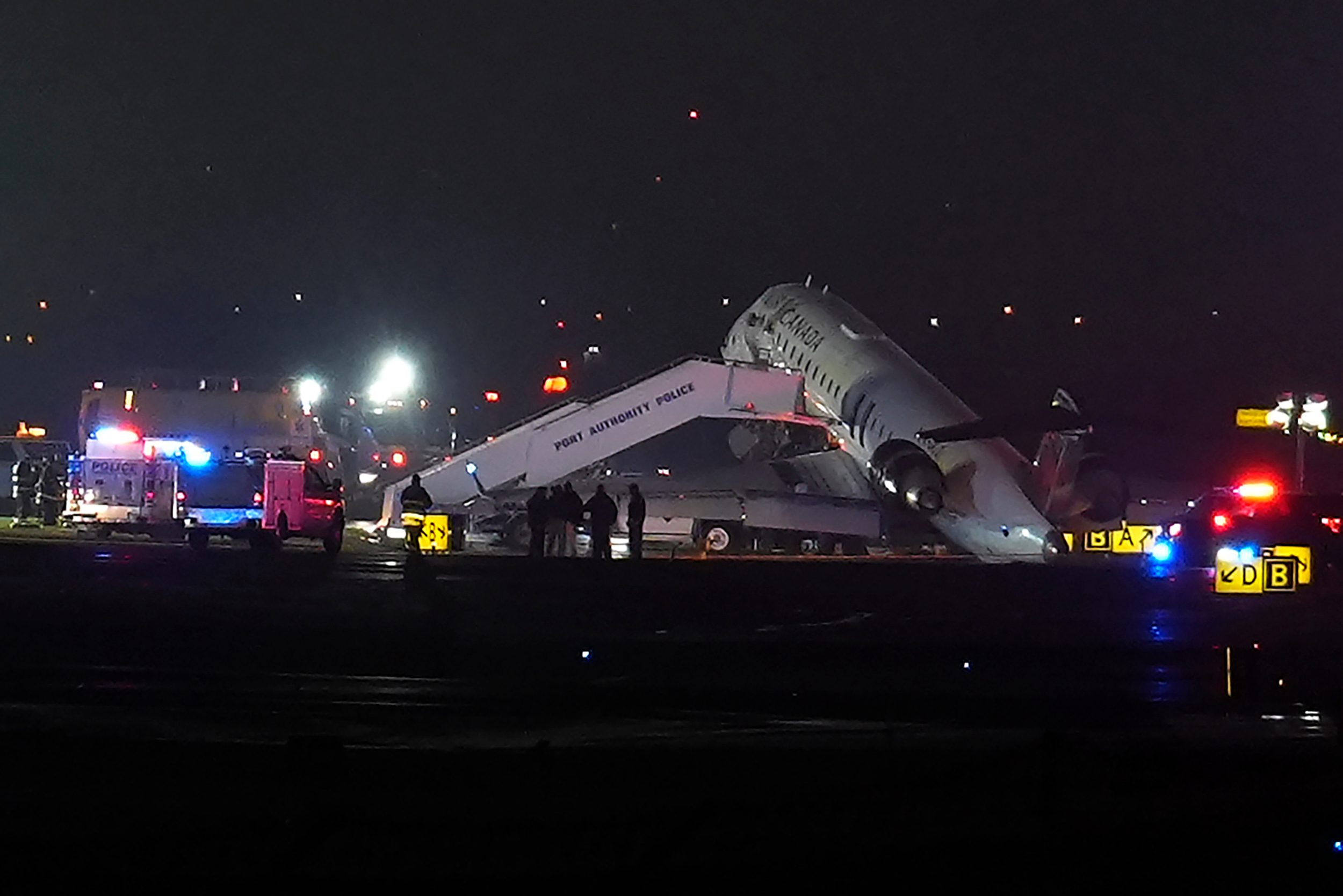 Air Canada jet collides with fire truck at LaGuardia Airport