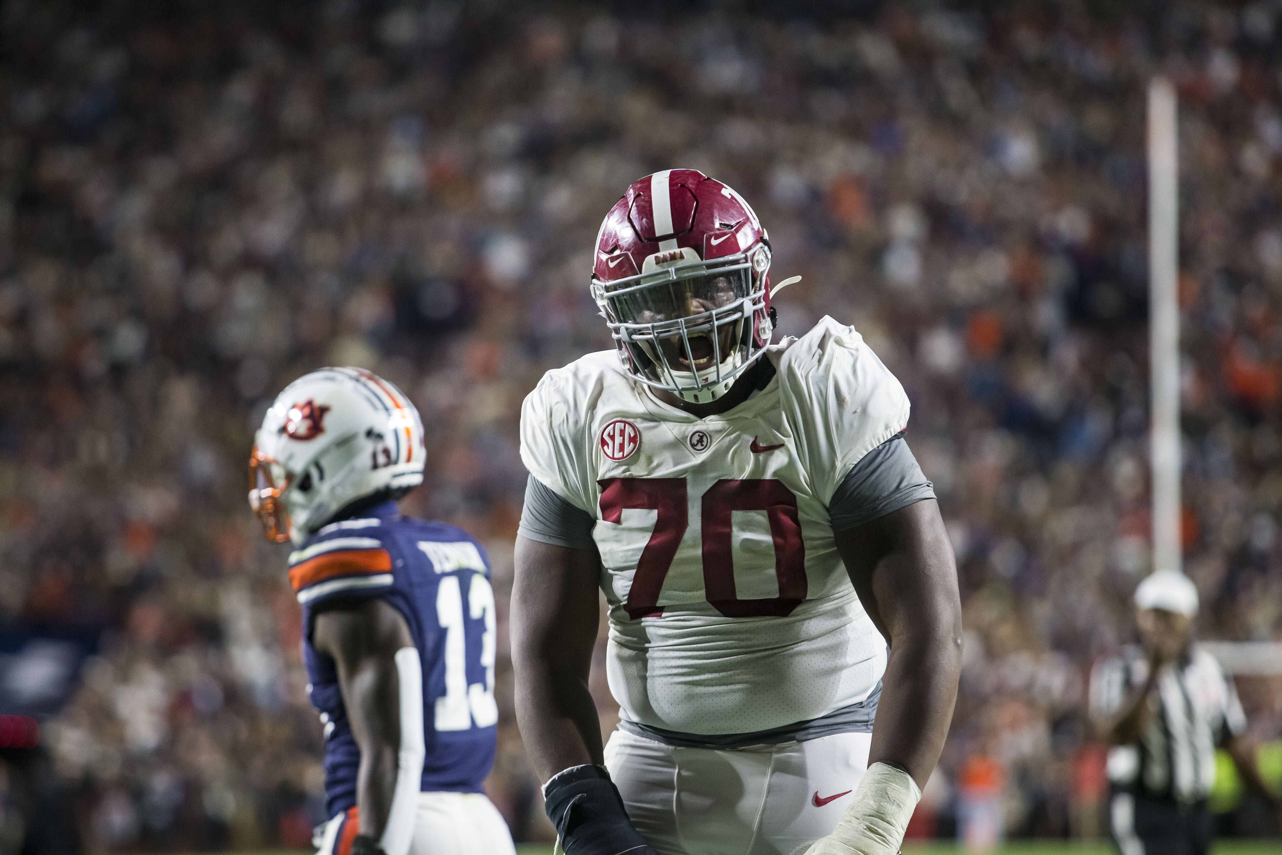 Alabama survives in 4OT over Auburn