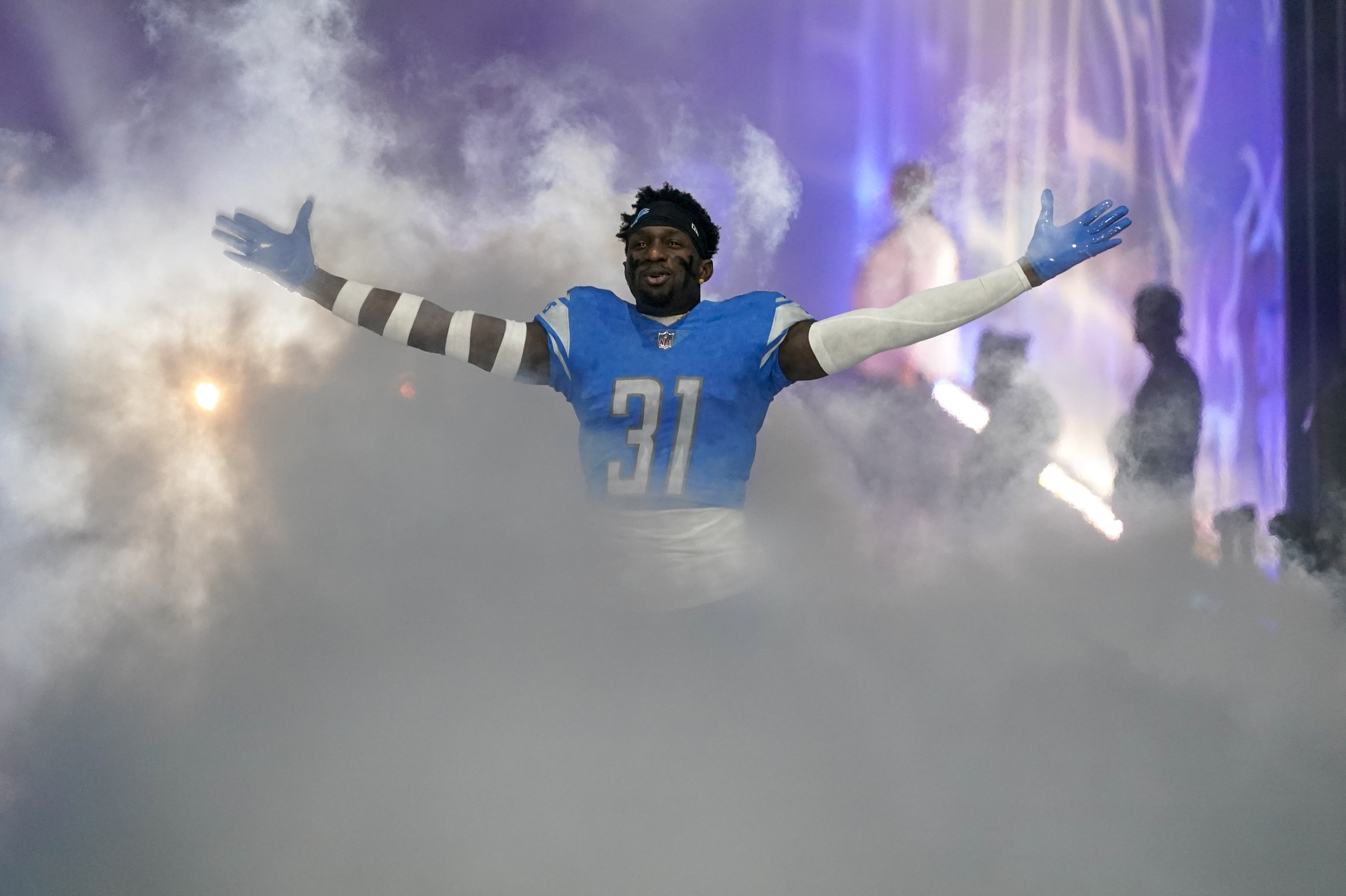 DETROIT, MI - DECEMBER 11: Detroit Lions Defensive End (97) Aidan  Hutchinson closes in for a sack on Minnesota Vikings QB Kirk Cousins (8)  during the game between Minnesota Vikings and Detroit