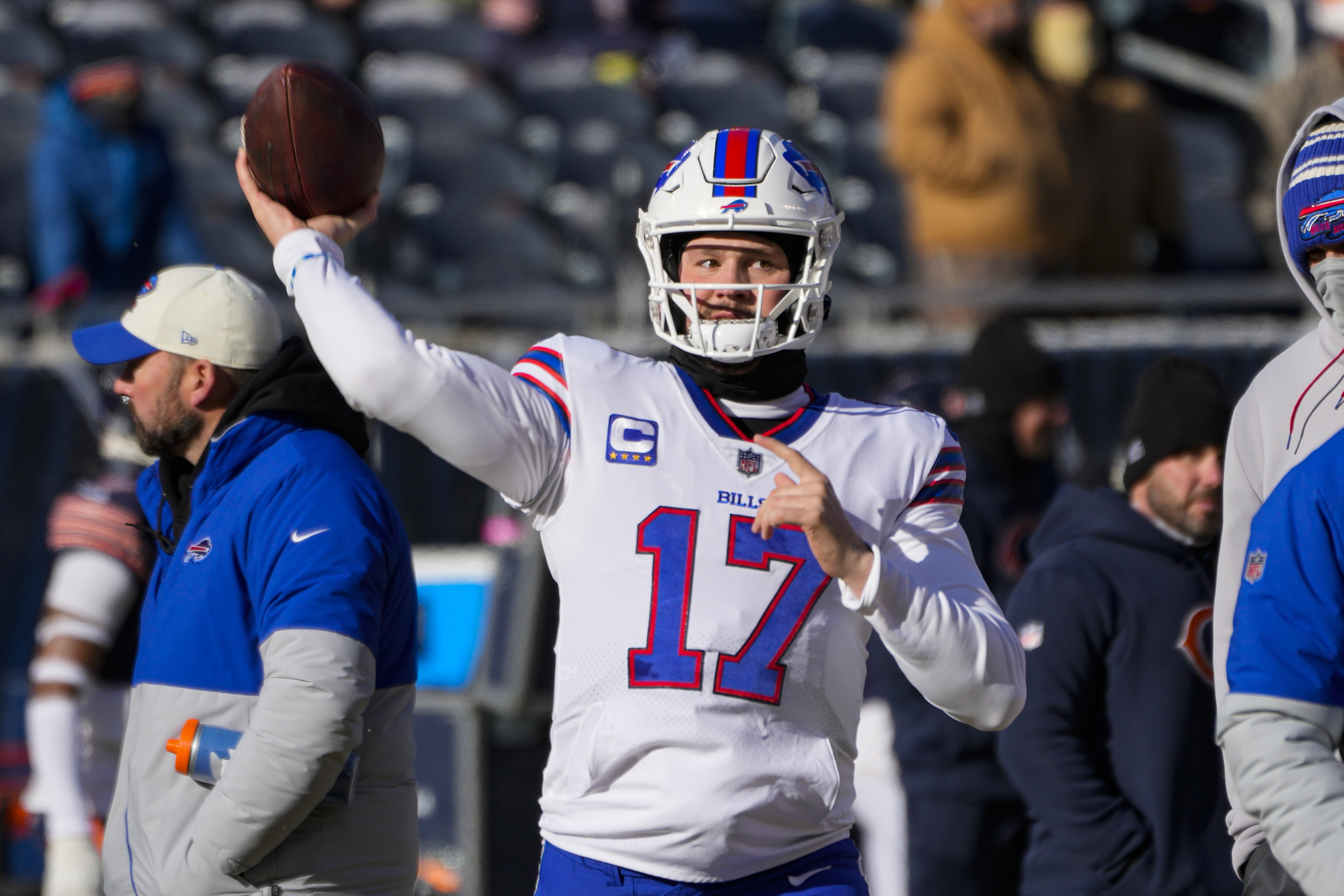 Buffalo Bills players dig cars out of snow after arriving back in