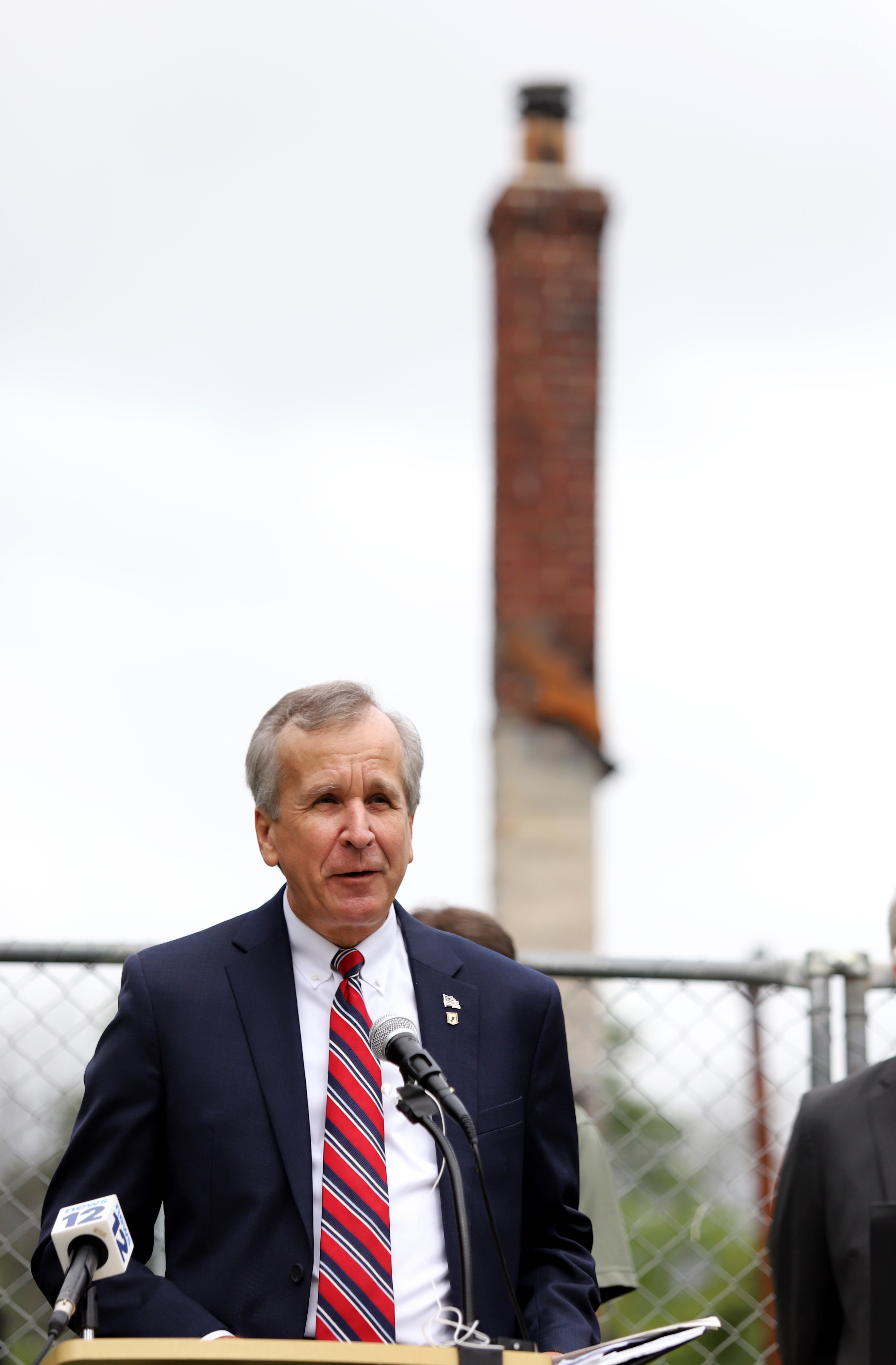 Environmental leaders and elected officials hold a press conference on flooding issues and