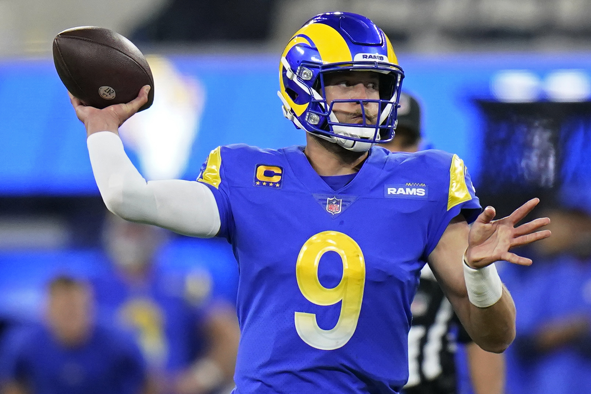 Matthew Stafford propels Rams past Cardinals 34-11 in playoff rout