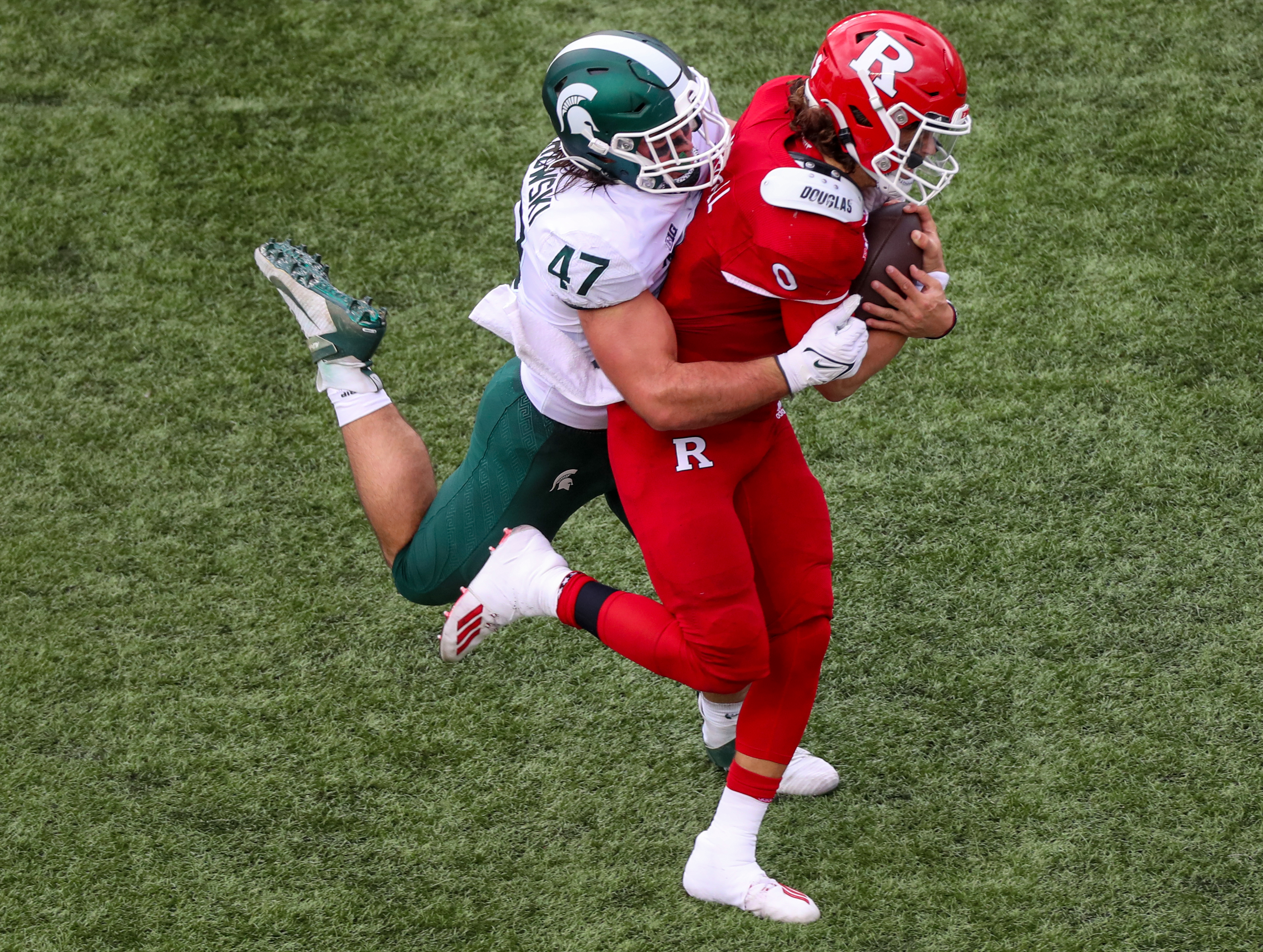 Rutgers quarterback Noah Vedral (0) passes against Michigan State during  the second half of an NCAA