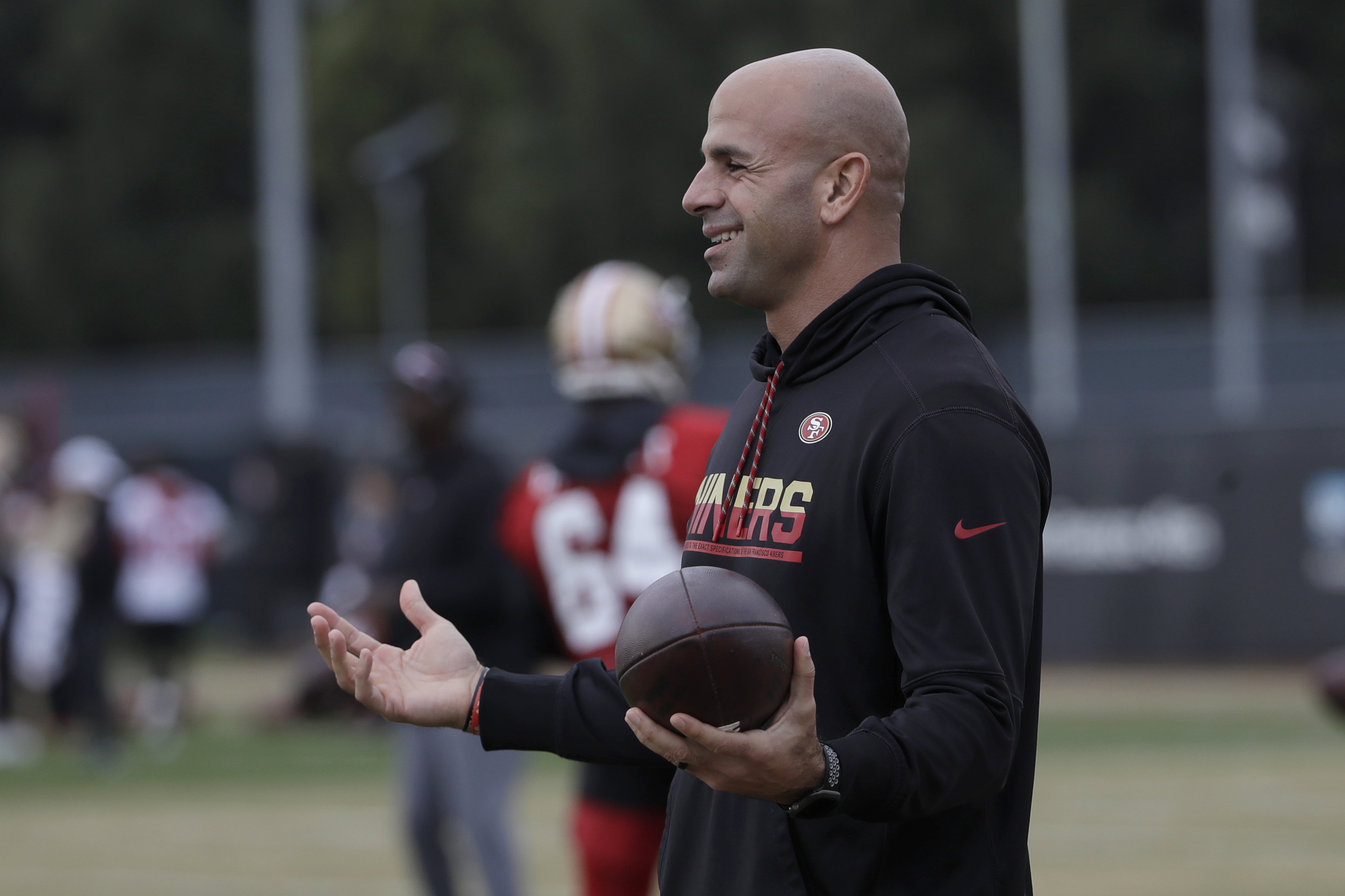 New York Jets head coach Robert Saleh wears New York Islanders