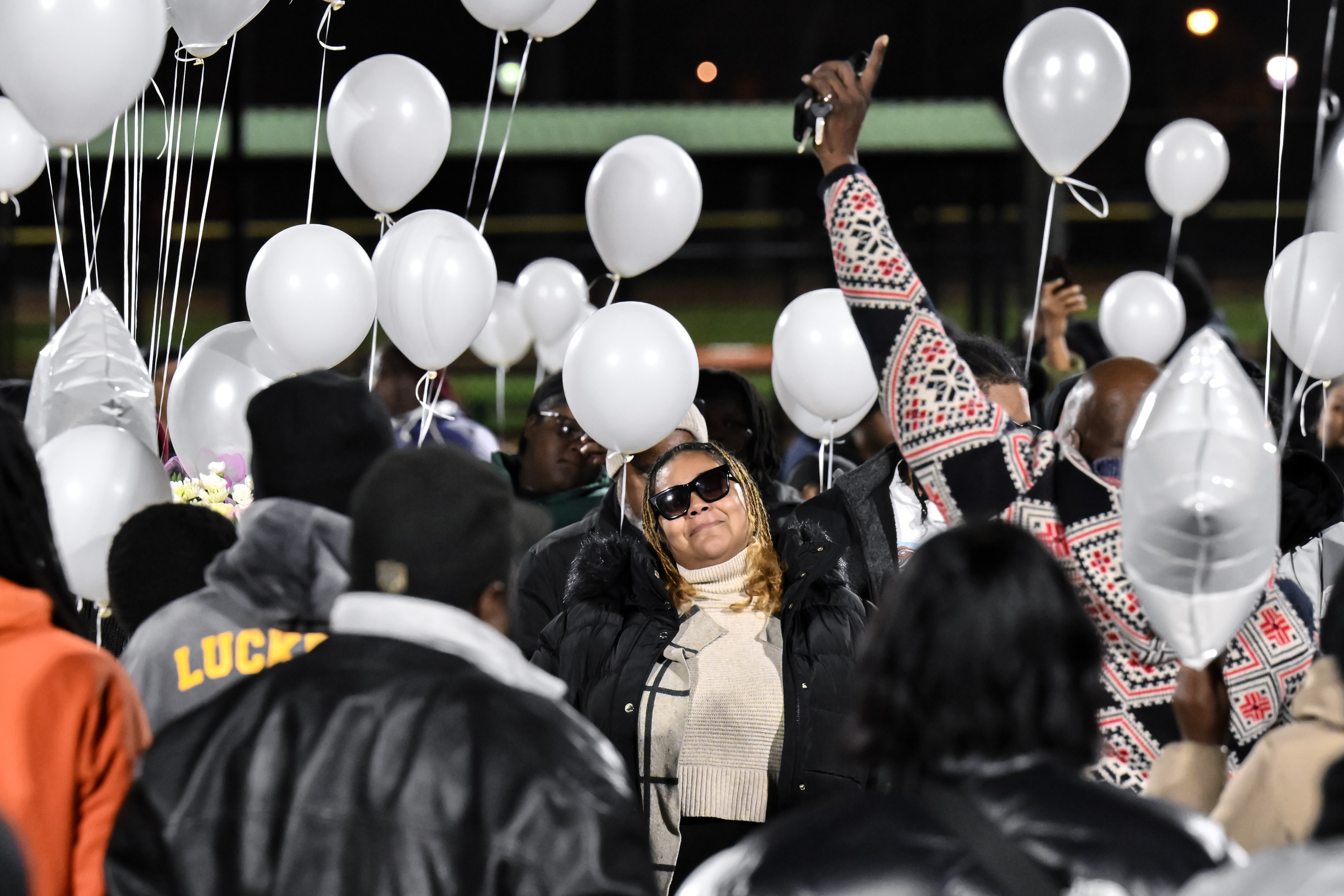 Community honors Newark shooting victims with a balloon release ...