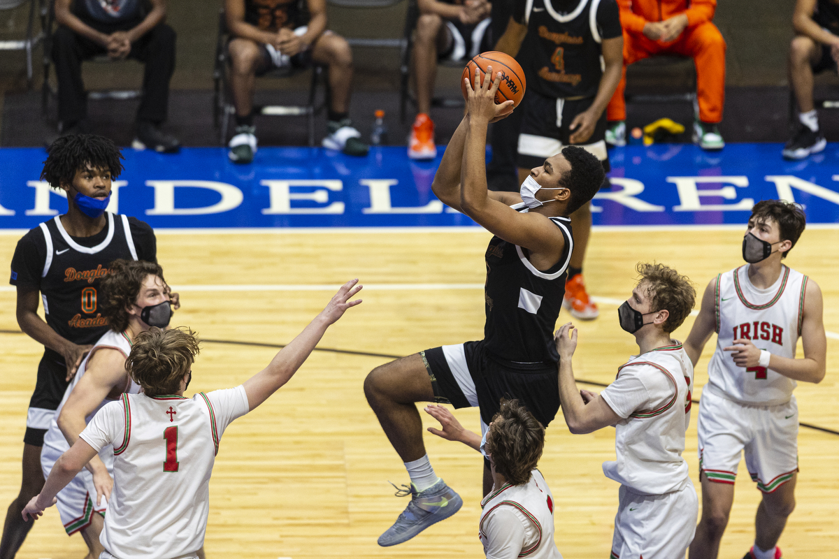 Photos of Detroit Douglass basketball player Pierre Brooks II