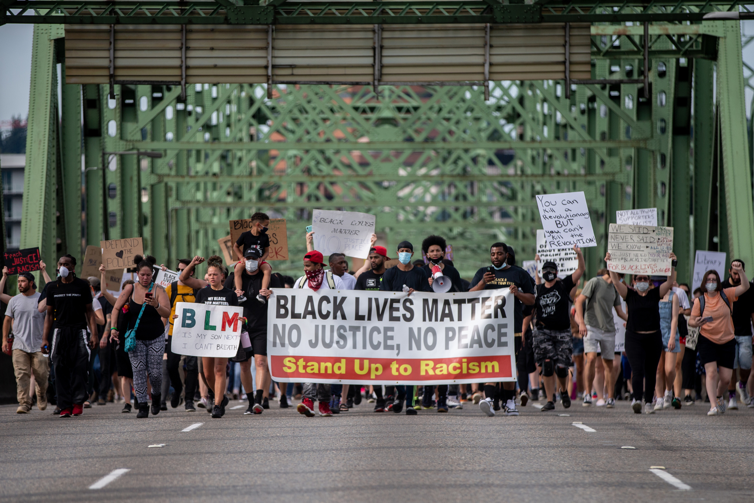 Protesters marched on the Interstate Bridge to celebrate Juneteenth on Friday, June 19, 2020. Mark Graves/staff