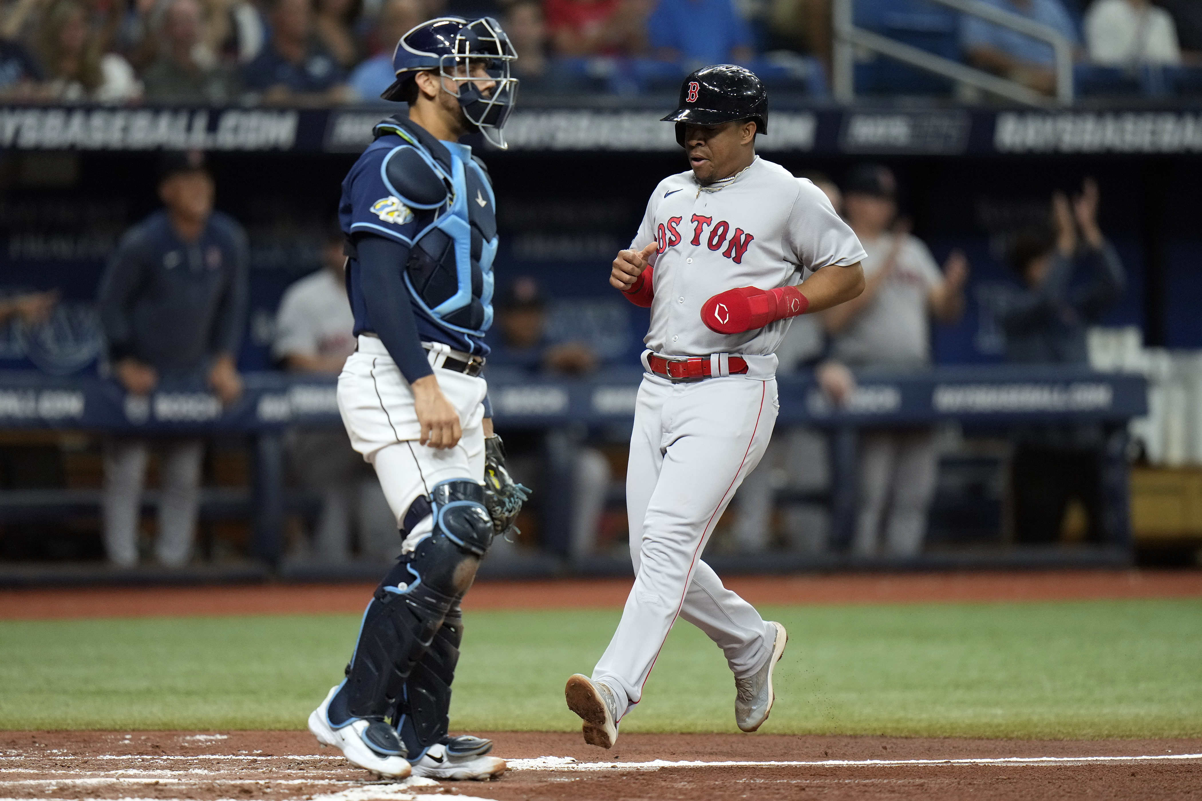 Blue Jays grind out 13-inning win over Red Sox to keep playoff