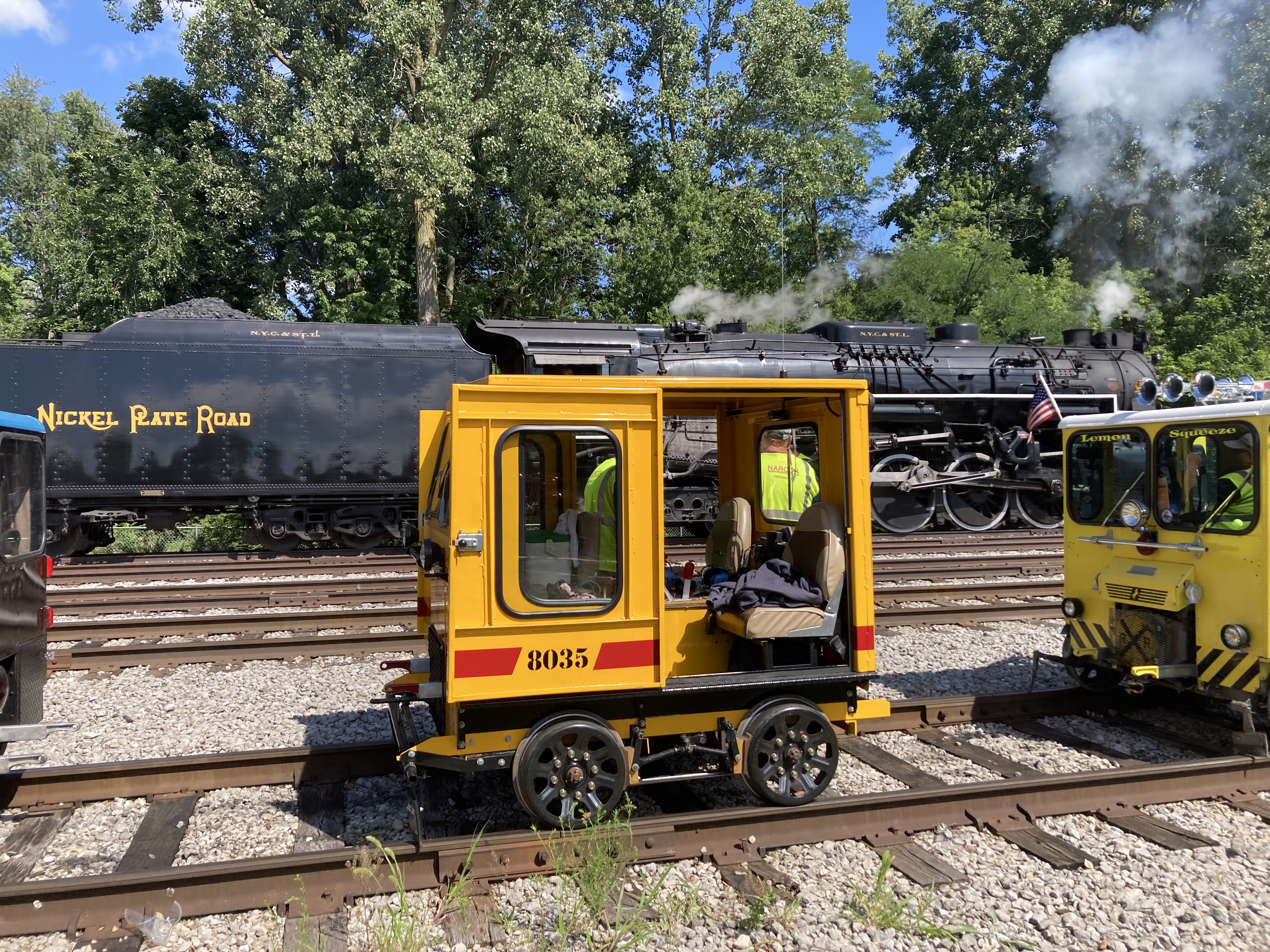 Hobbyists tour Michigan turn heads in tiny retired railcars